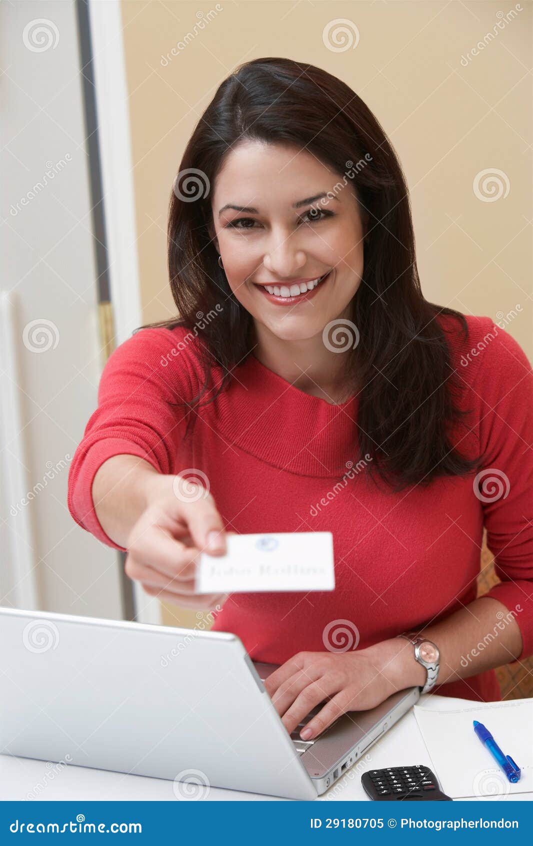 Receptionist Fering Name Tag In Fice Stock Image