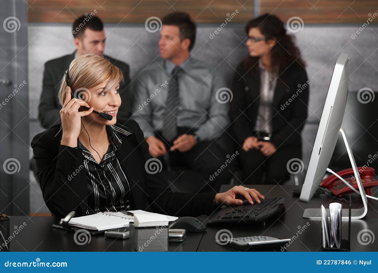 receptionist talking on phone