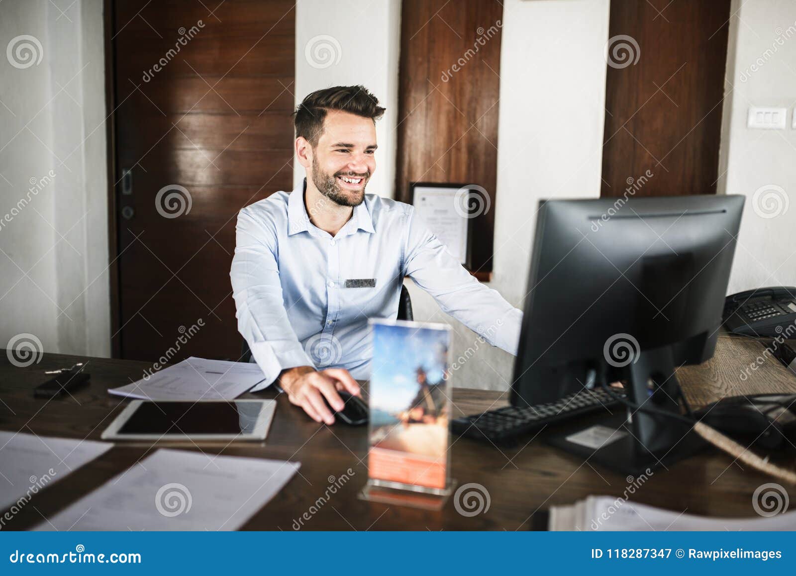Receptionist Working At The Front Desk Stock Image Image Of