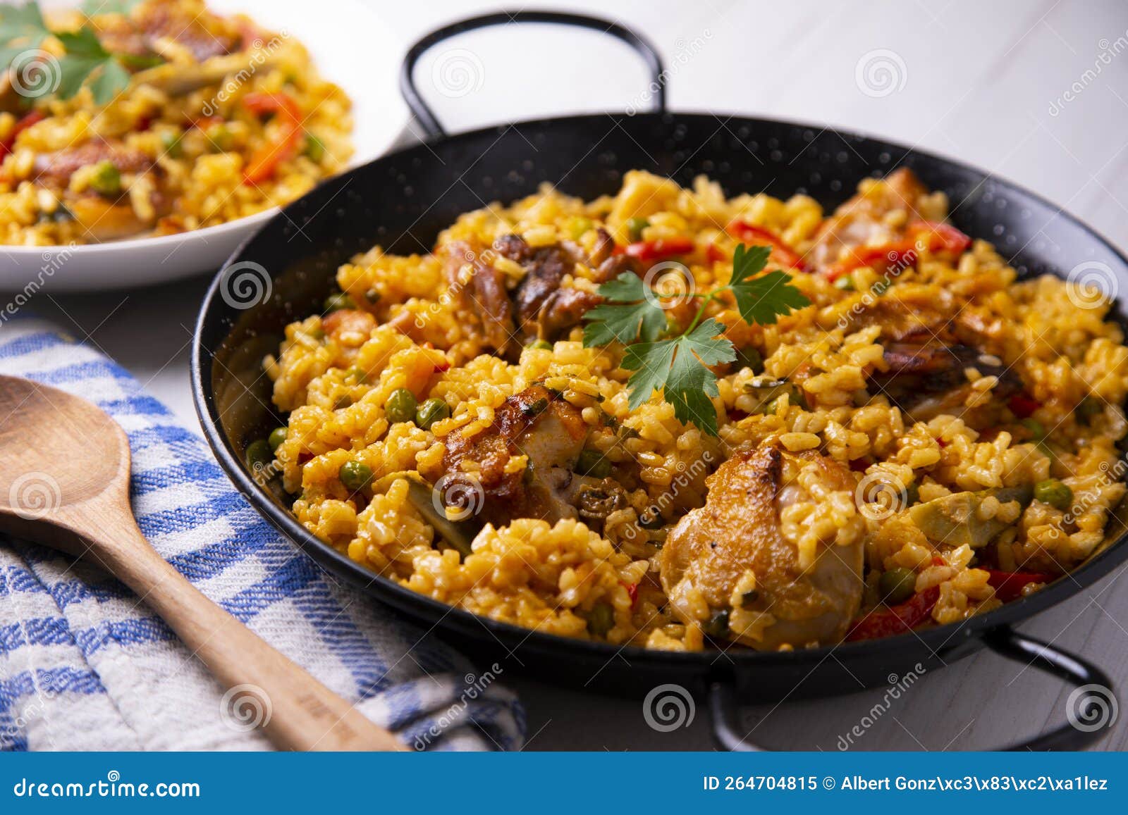 Baked Chicken Rice Paella with Vegetables. Traditional Spanish Recipe