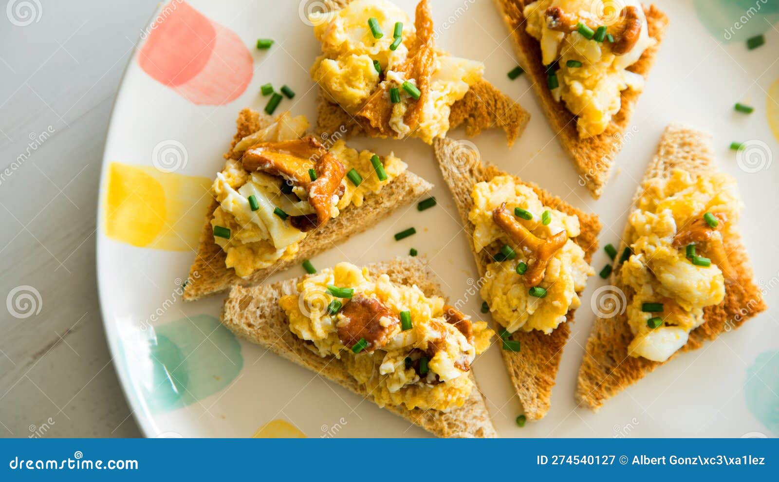 Scrambled with Eggs and Mushrooms on Toasted Bread. Stock Image - Image