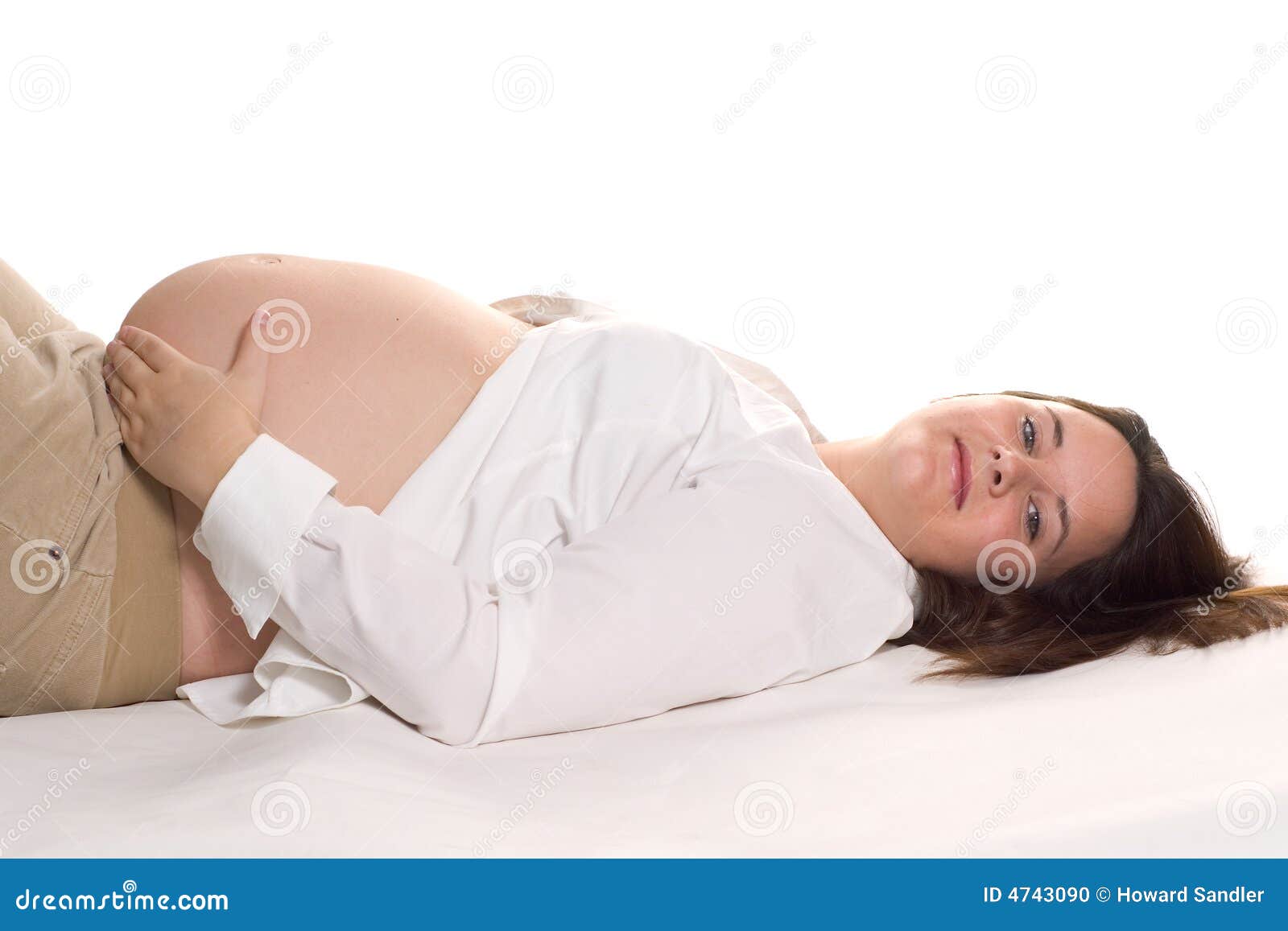 Reclining Pregnant Woman stock photo. Image of face, redhead 4743090