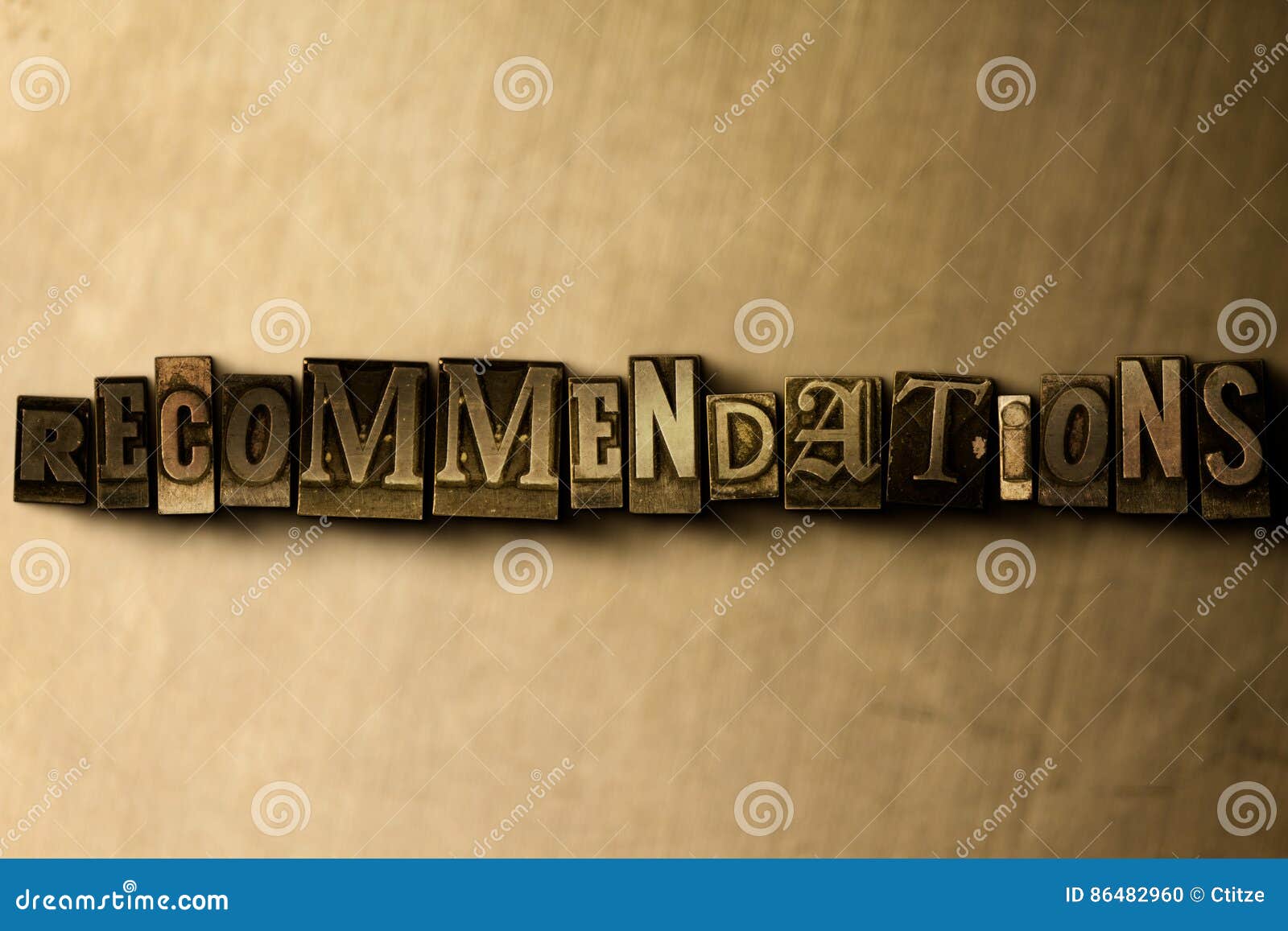 recommendations - close-up of grungy vintage typeset word on metal backdrop