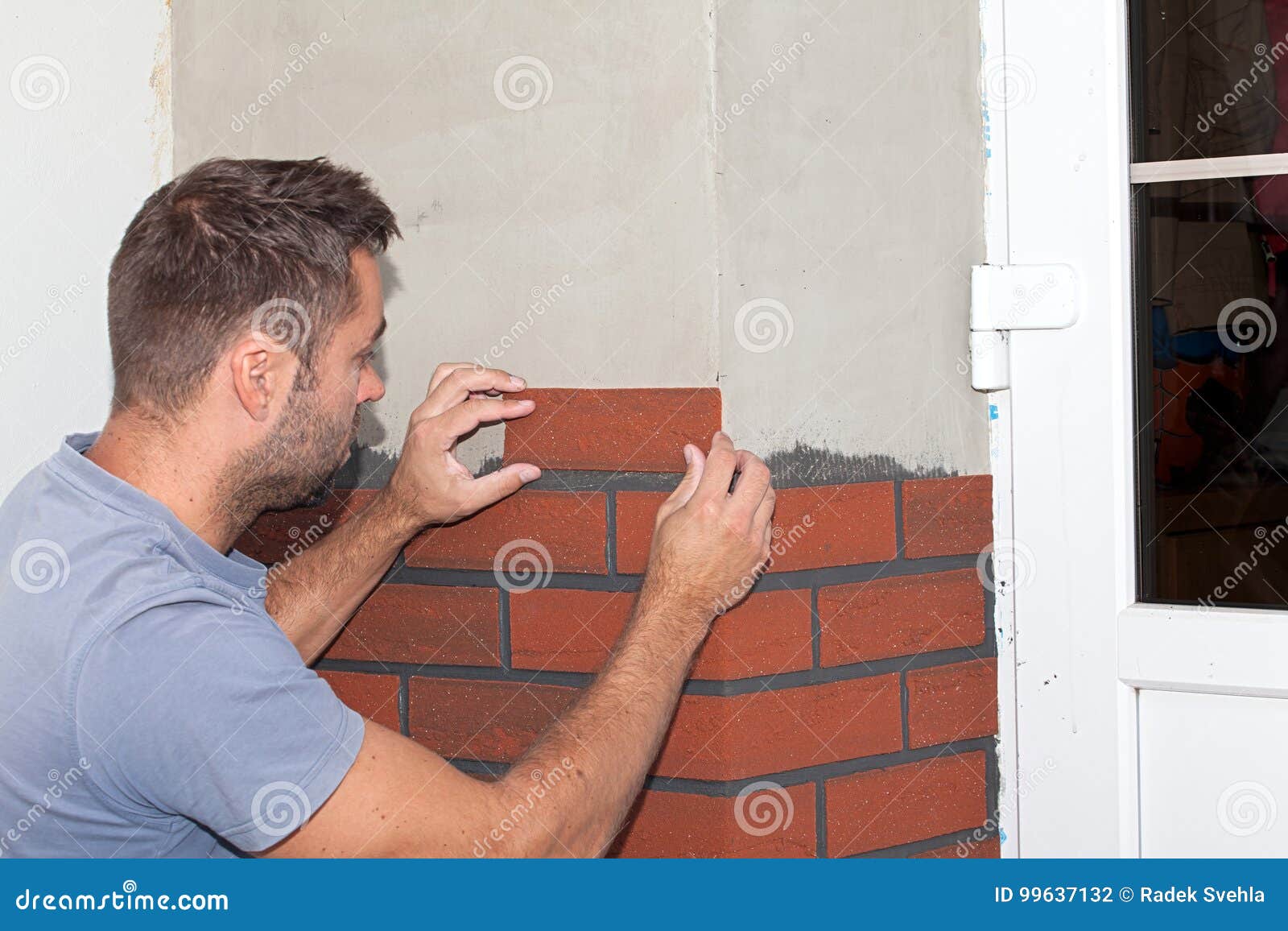 Finishing Work on the New Facade. Stock Photo Image of handyman