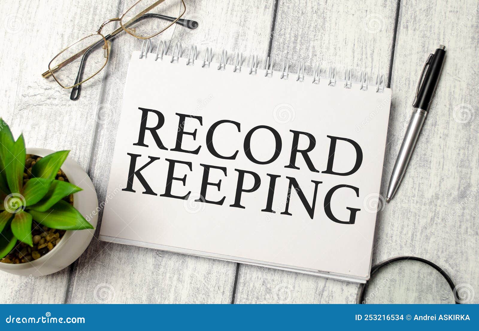 RECORD KEEPING Words on Notepad and Pen, Calculator and Glasses Stock