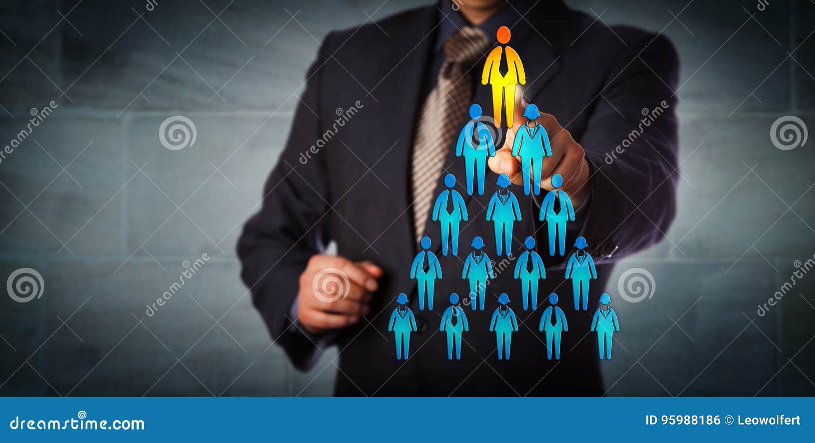 recruiter selecting man atop corporate hierarchy