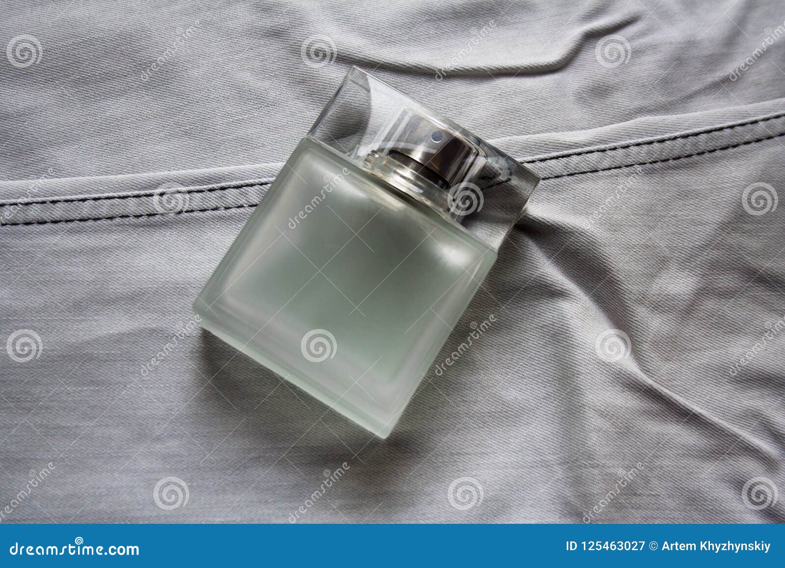 Rectangular Perfume Bottle on Light Grey Jeans Stock Image - Image of ...