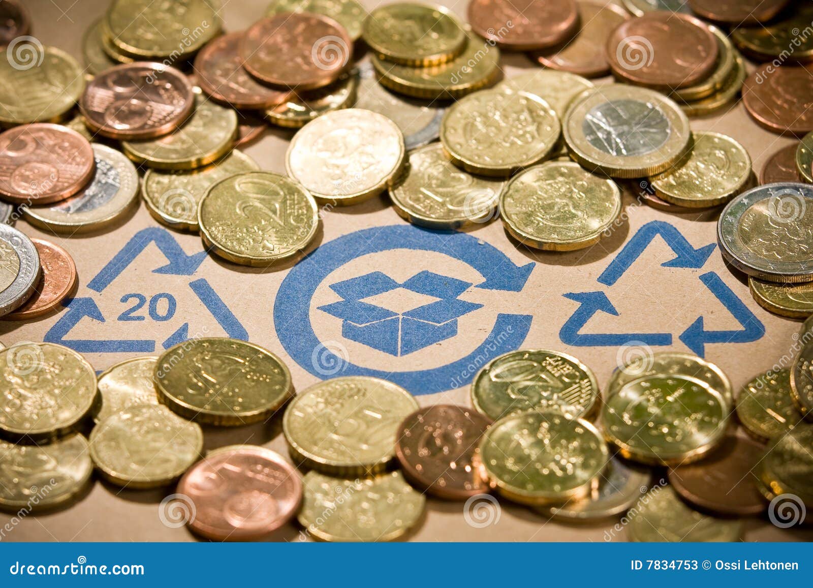 Recycle. Recycling sign on cardboard with euro coins