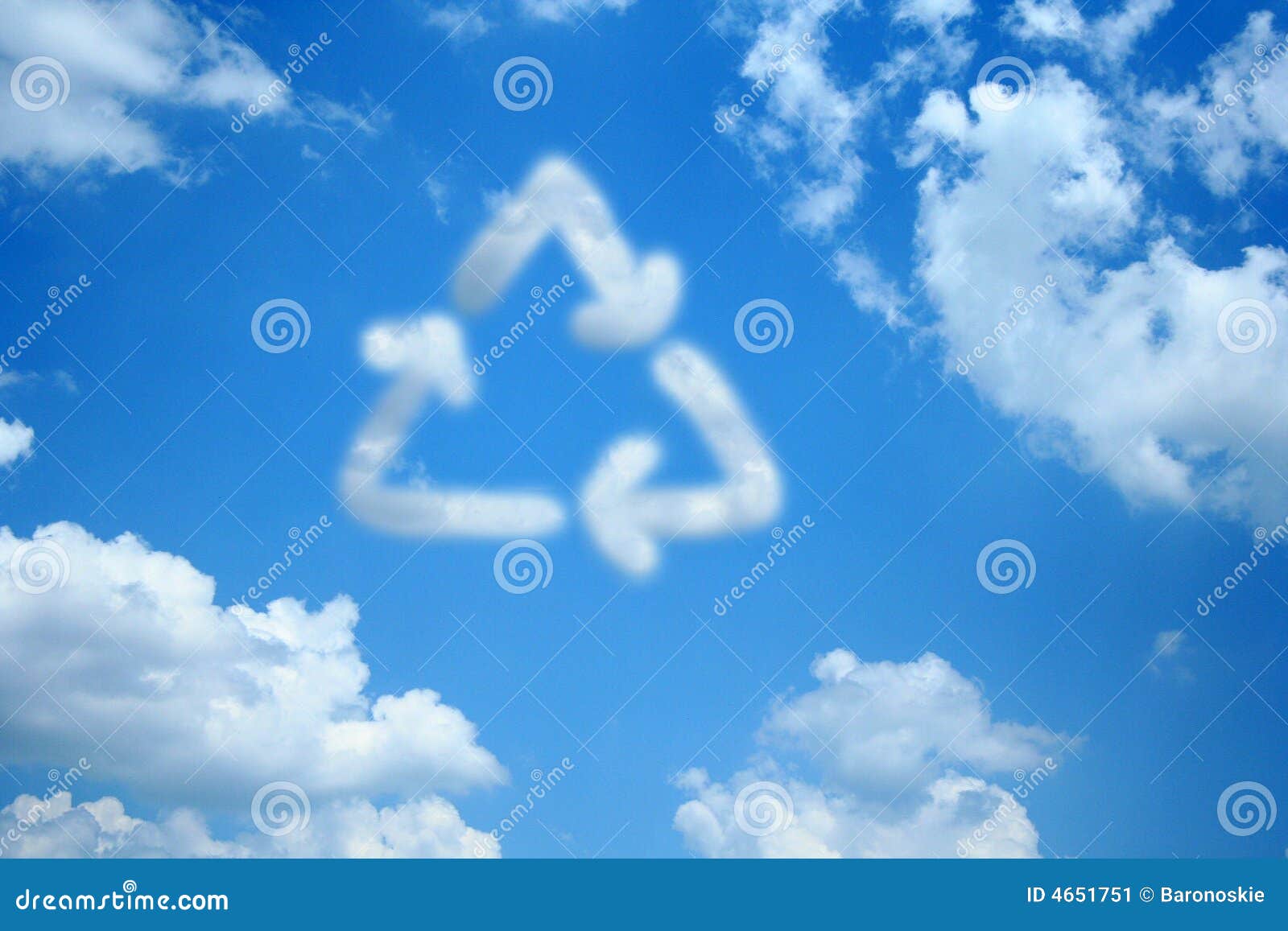 Recycle Cloud. A cloud in the shape of the recycle symbol stands out among the other clouds in the blue sky.