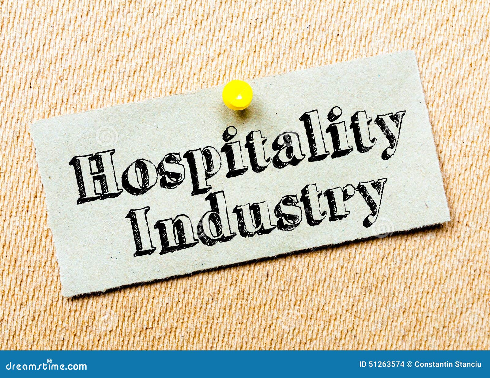 recycled paper note pinned on cork board. hospitality industry message