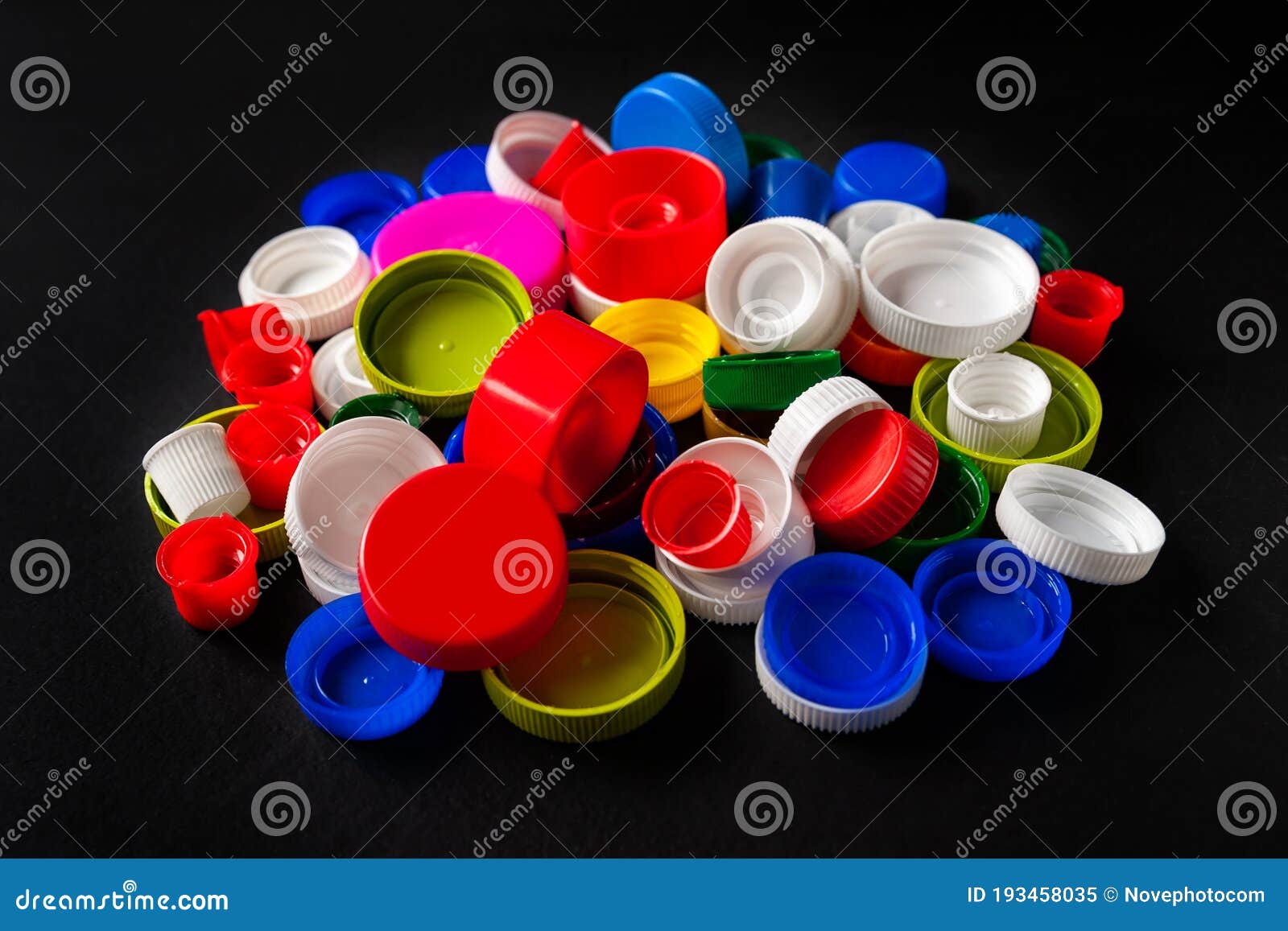 Recycled Plastic Bottle Caps. Colorful Caps Of Plastic Bottles On A ...
