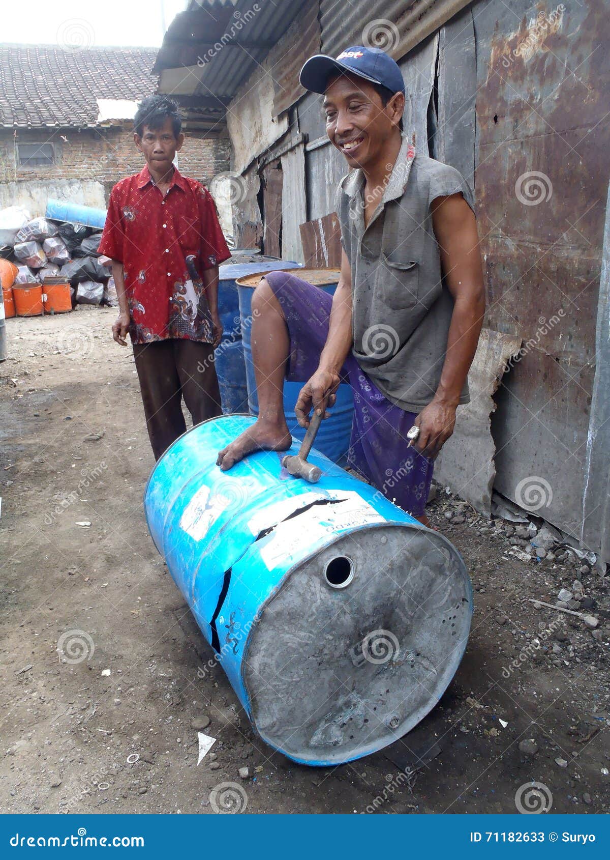 Recycling drums editorial stock photo. Image of workers 71182633