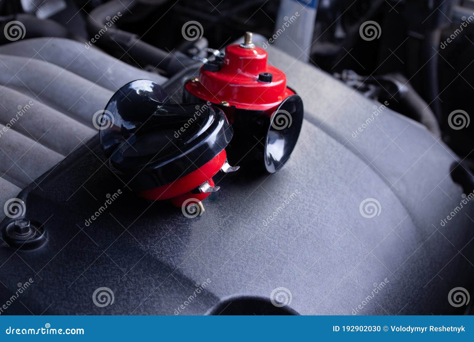 Red Air Horn for a Car on a Car Engine. Electric Car Air Horn Stock