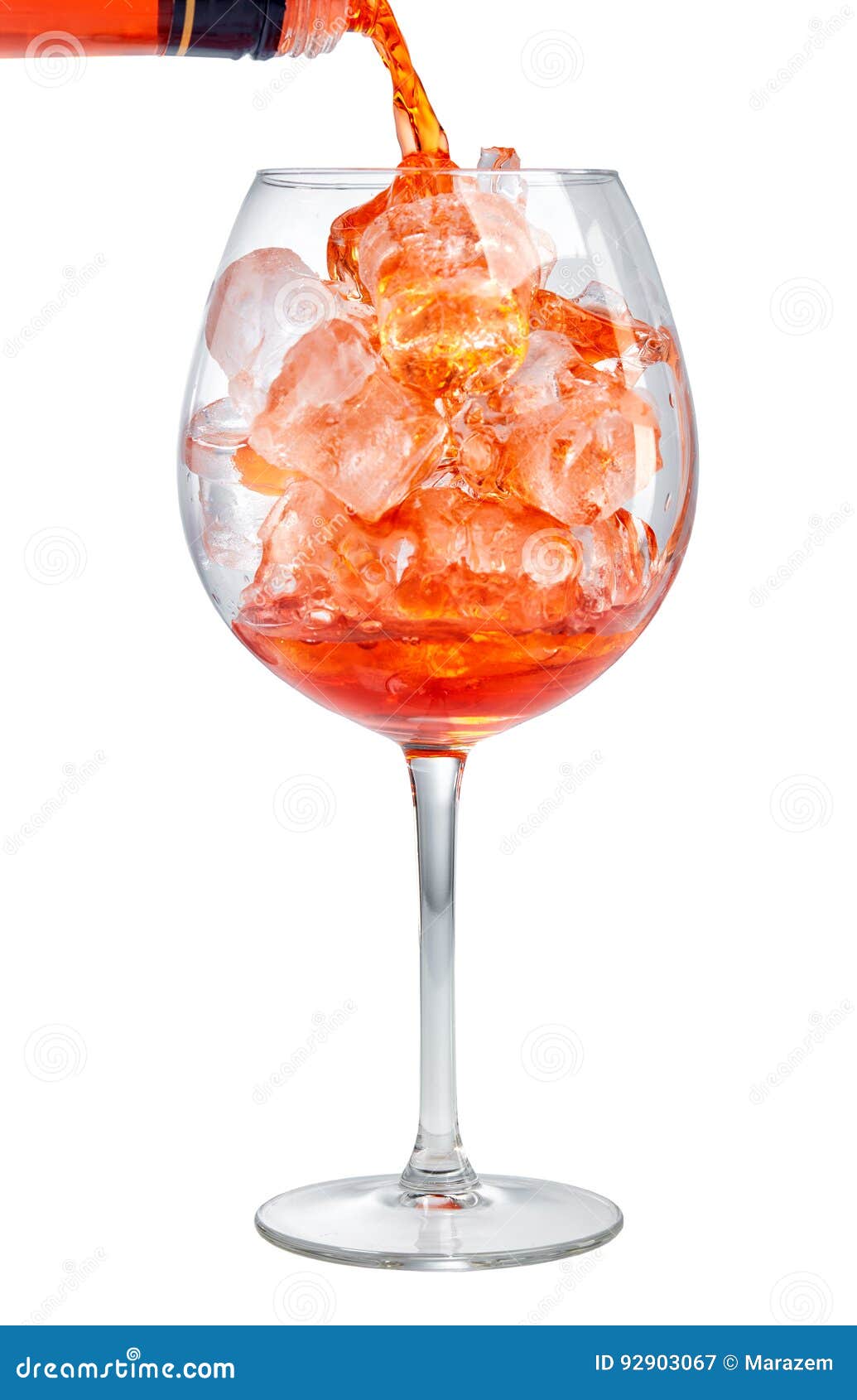 red aperitif pouring into glass