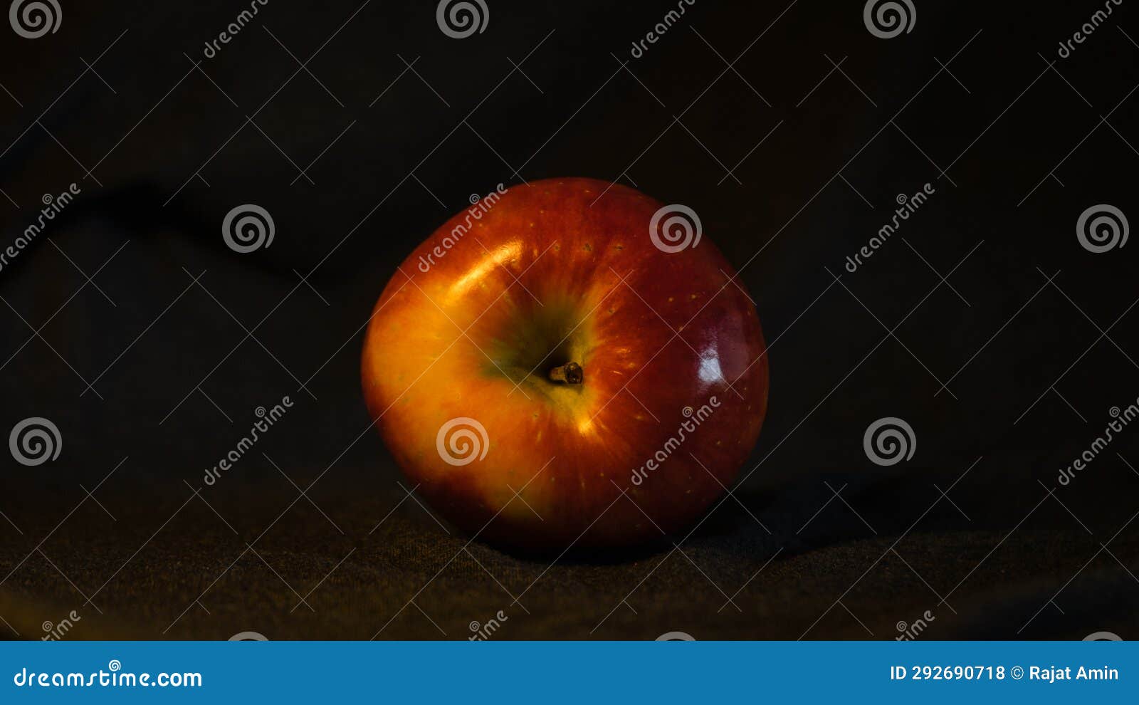 red apple on a dark background. shallow depth of field.