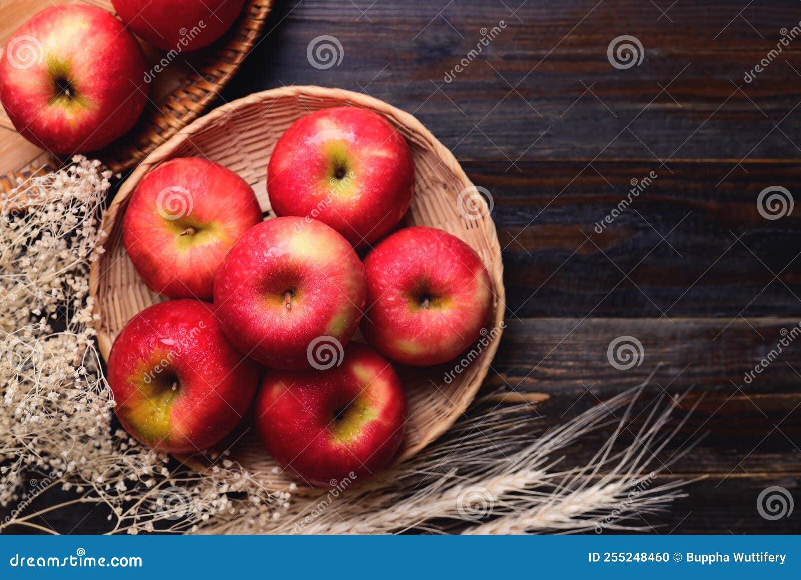Red Apple Fruit in Basket on Wooden Background with Copy Space Stock
