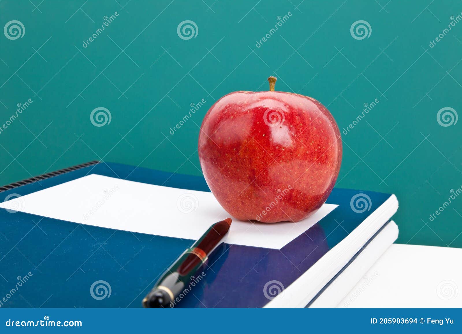 Red apple and Textbook stock photo. Image of book, background - 205903694