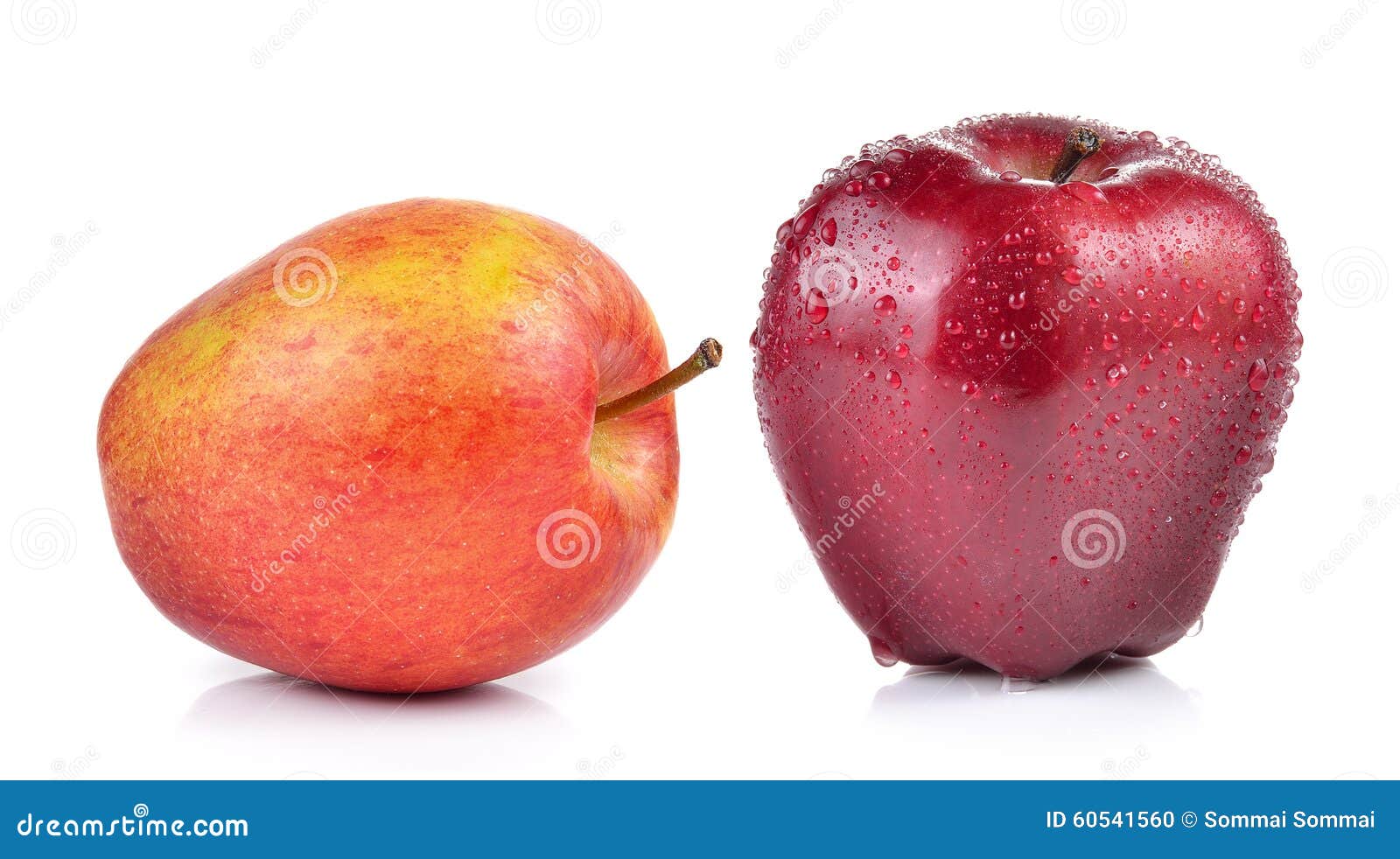 Red apple with water drops on a white background