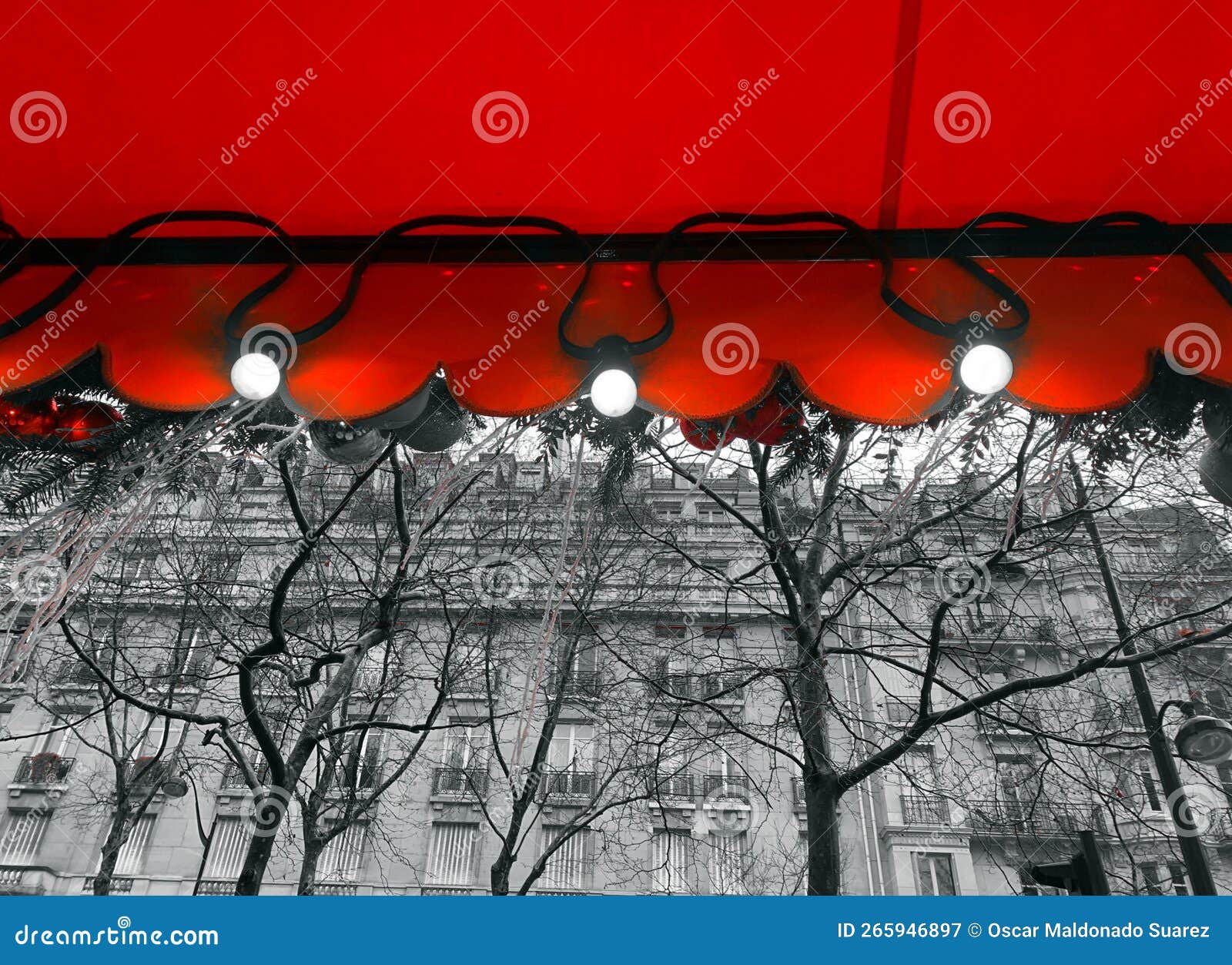 red awning under grey rain - paris