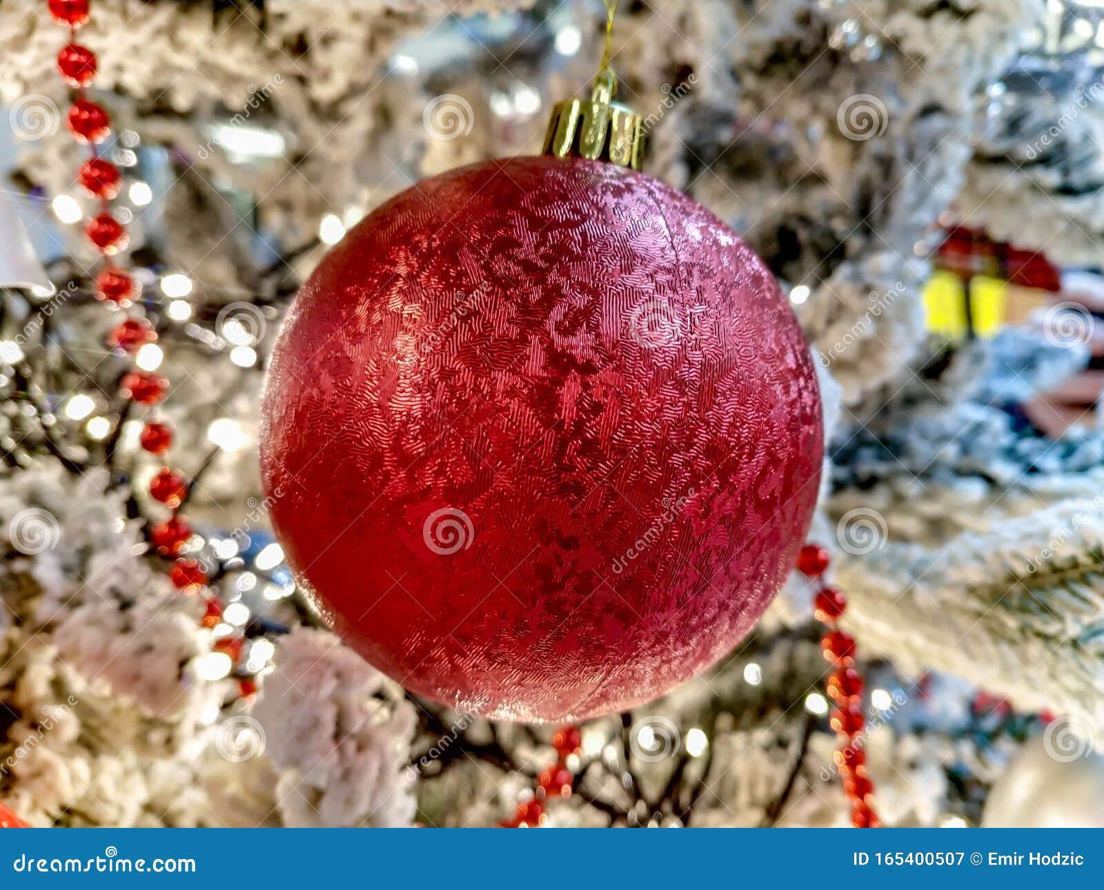 Red Ball Ornament Hanging on a Holiday Christmas Tree As Home ...