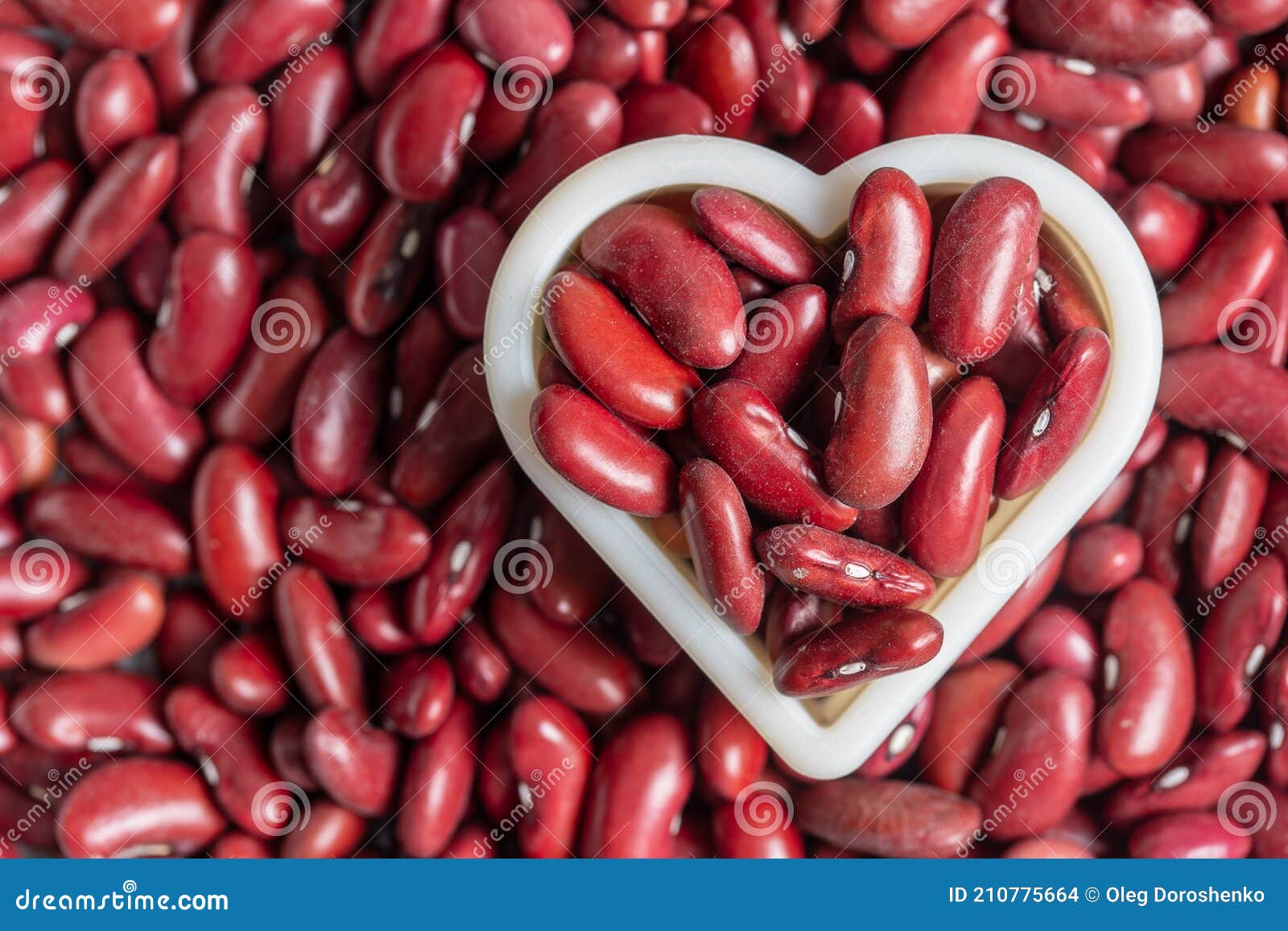 Red Bean Beans Together with a Heart Shape As Pattern Background Stock