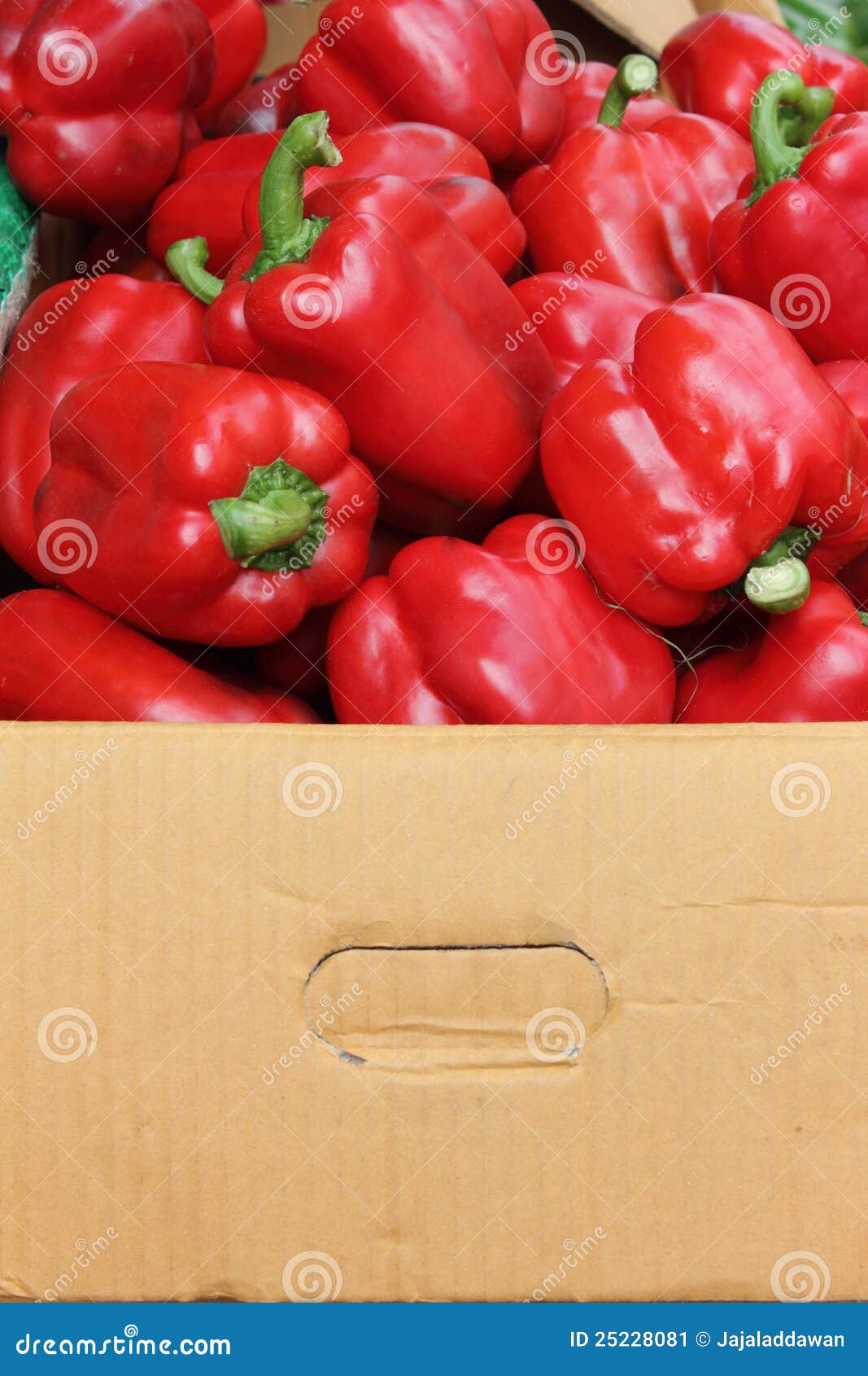 Red bell peppers in a box stock image. Image of eating 25228081