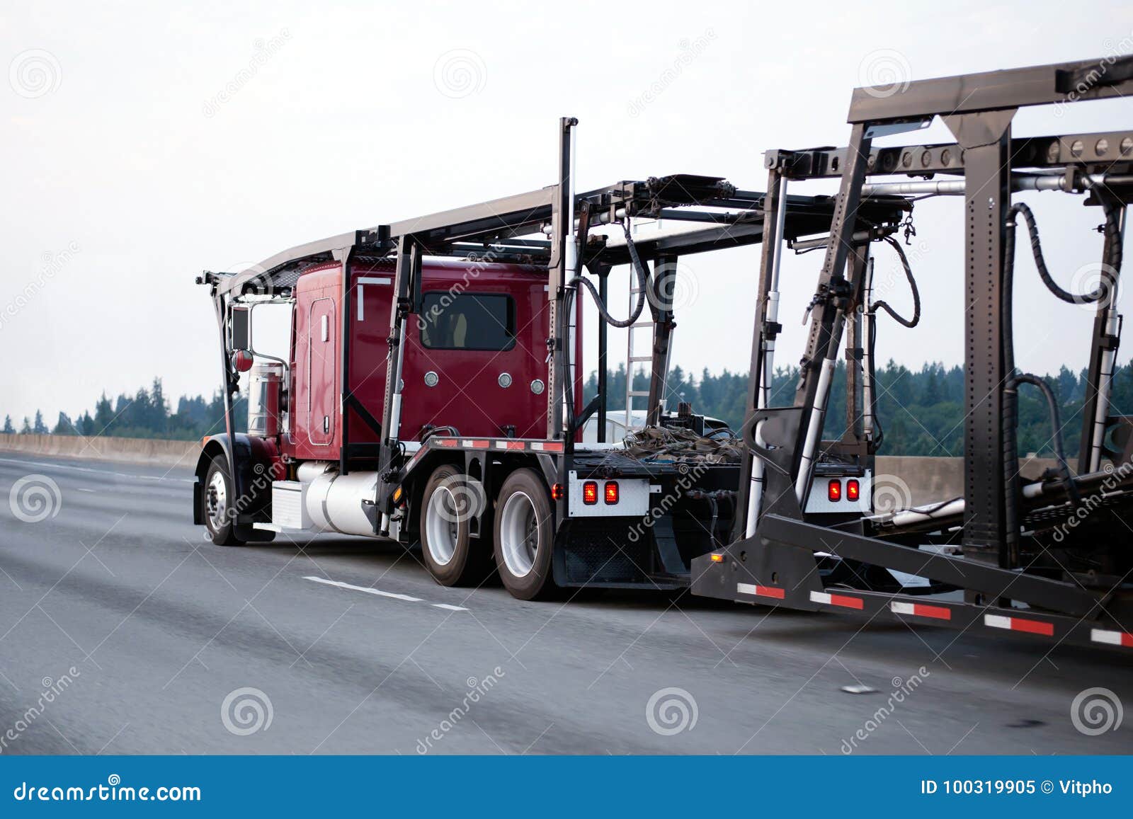 red big rig classic semi truck car hauler with empty trailer run