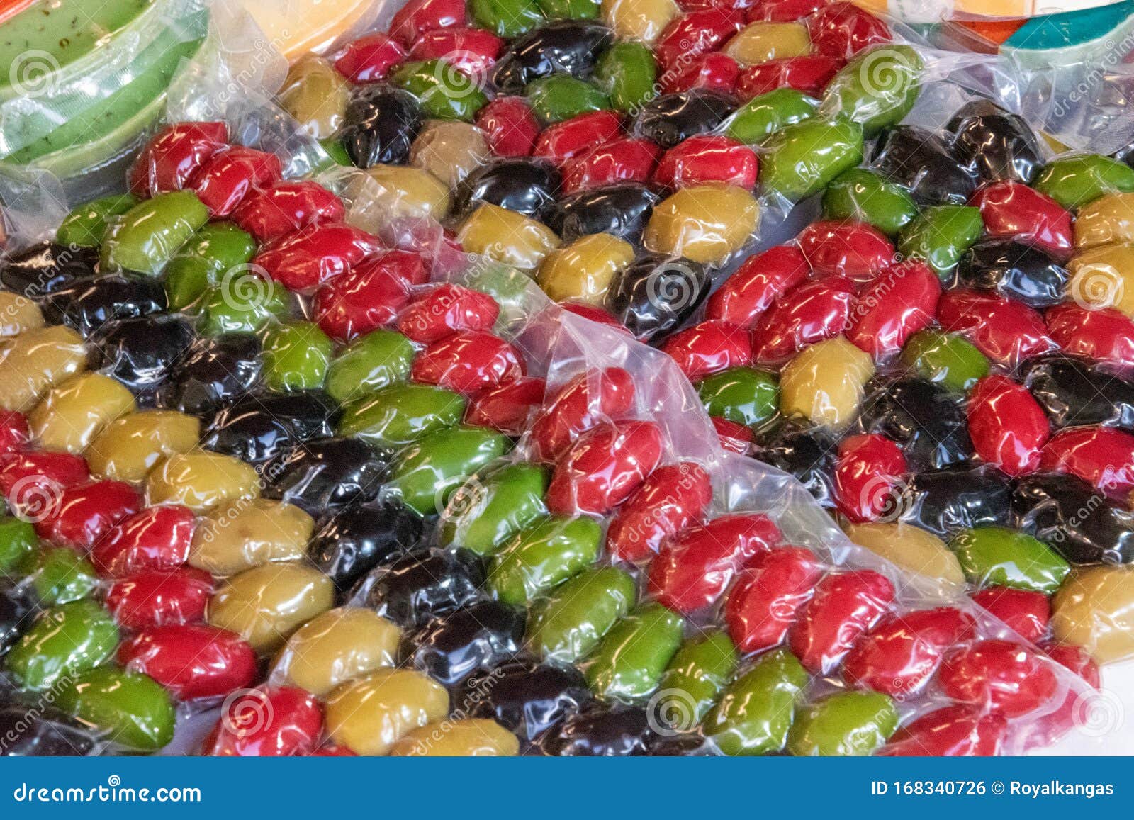 Red, Black and Green Olives Packaged for Sale Stock Photo Image of
