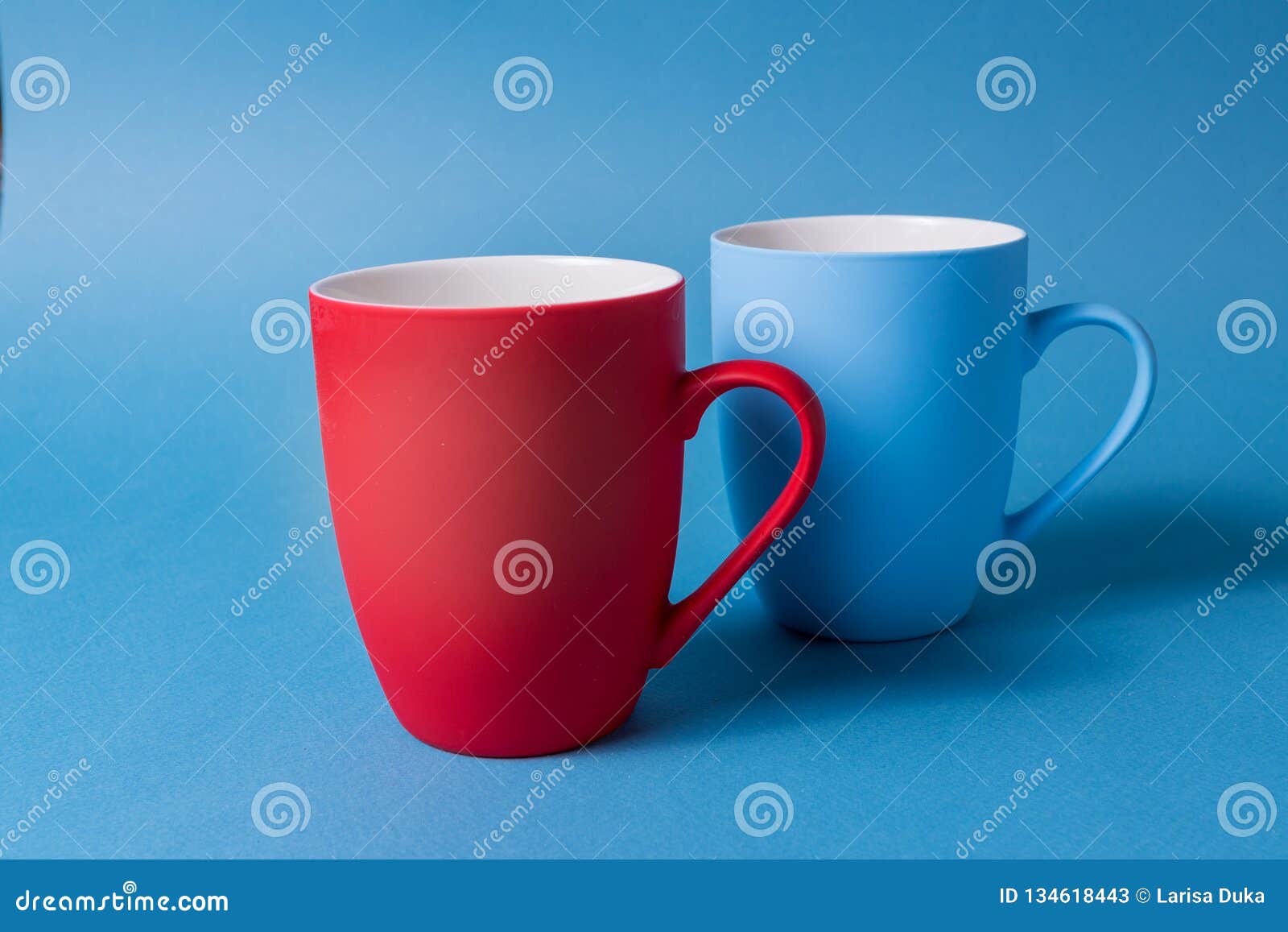Red and Blue Mugs on a Blue Background Stock Image Image of chocolate