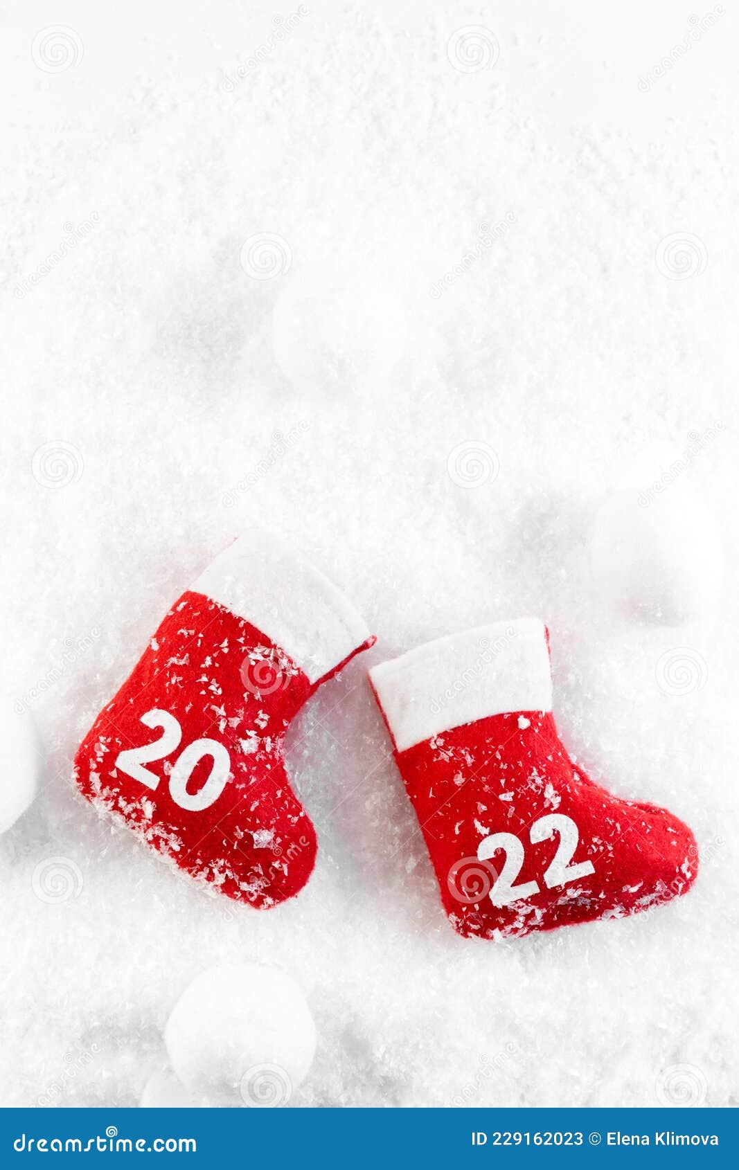 Red Boots of Santa Claus in the Snow. Christmas Boot. New Year 2022 ...