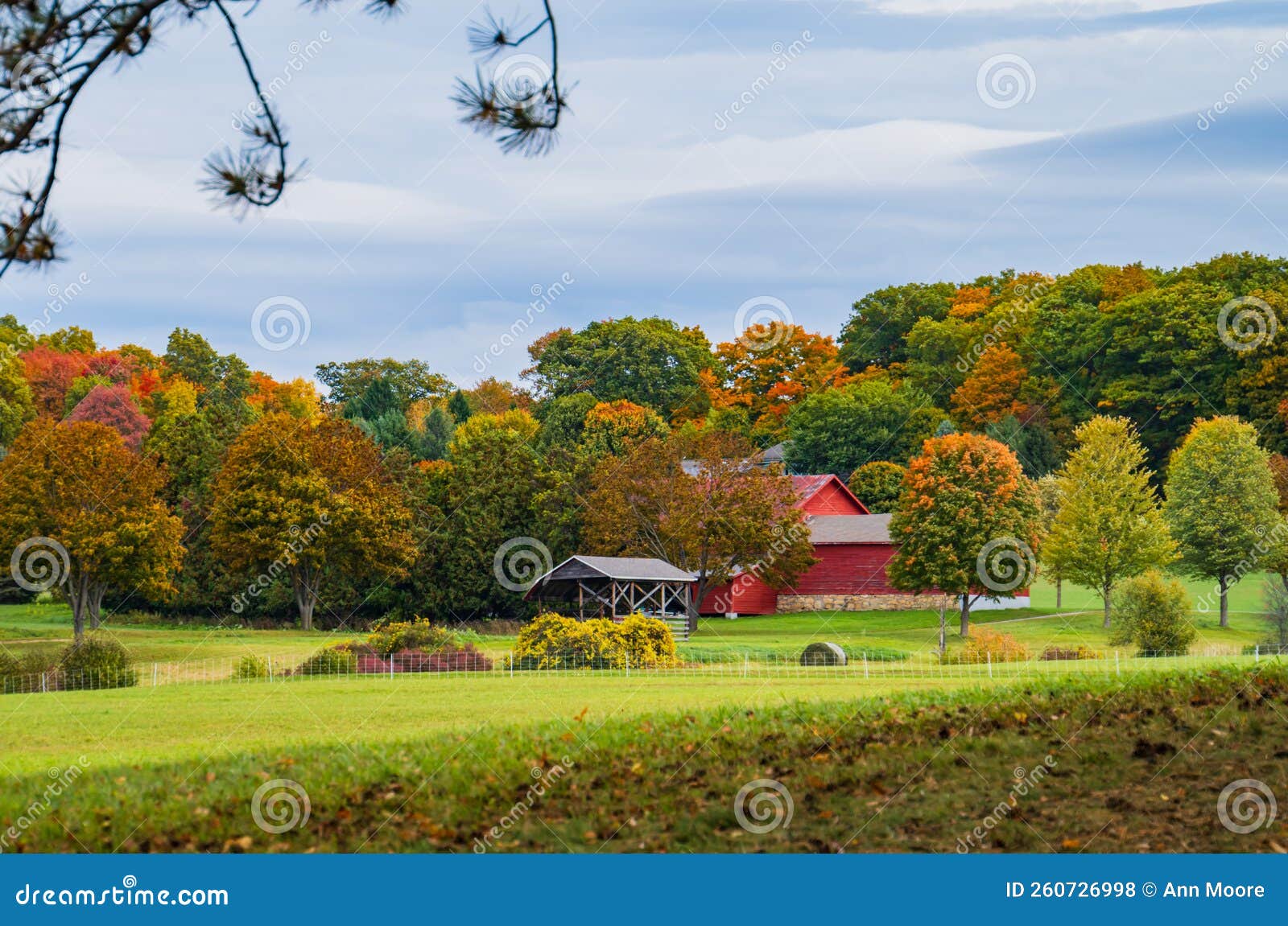 red buildings on a vermont farm in autumn