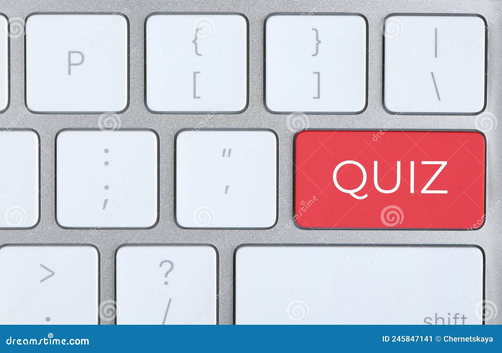 Red Button with Word QUIZ on Computer Keyboard, Top View Stock Image
