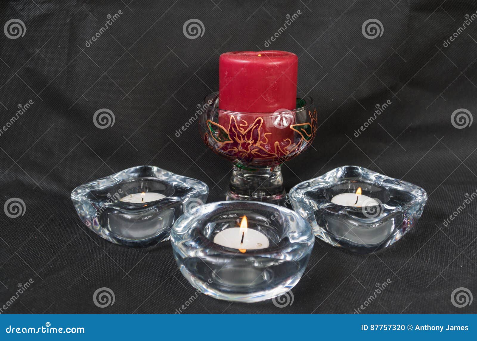 Red Candle with 3 White Candles in Holders Stock Photo Image of white