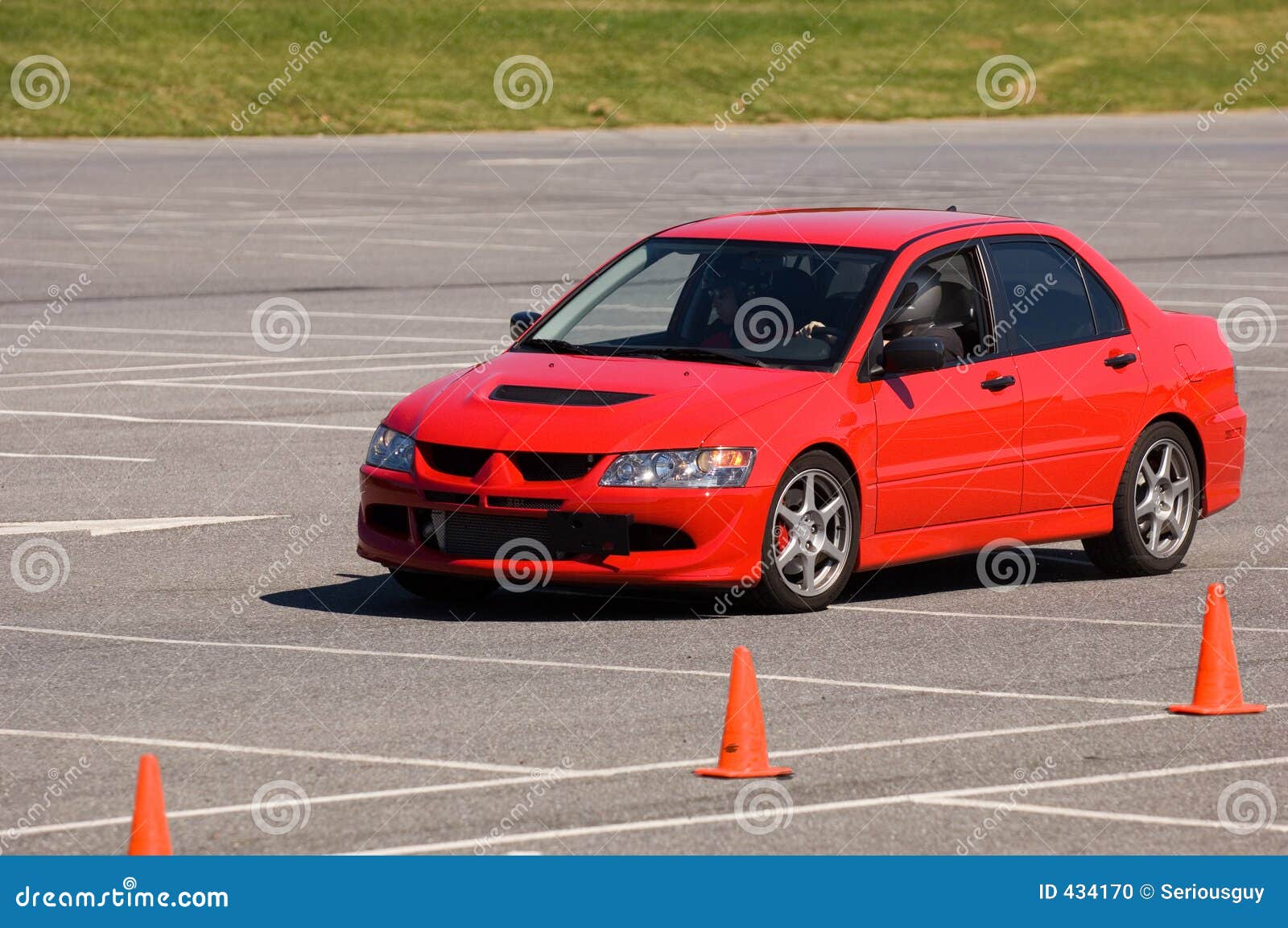 red car during autocross event 1