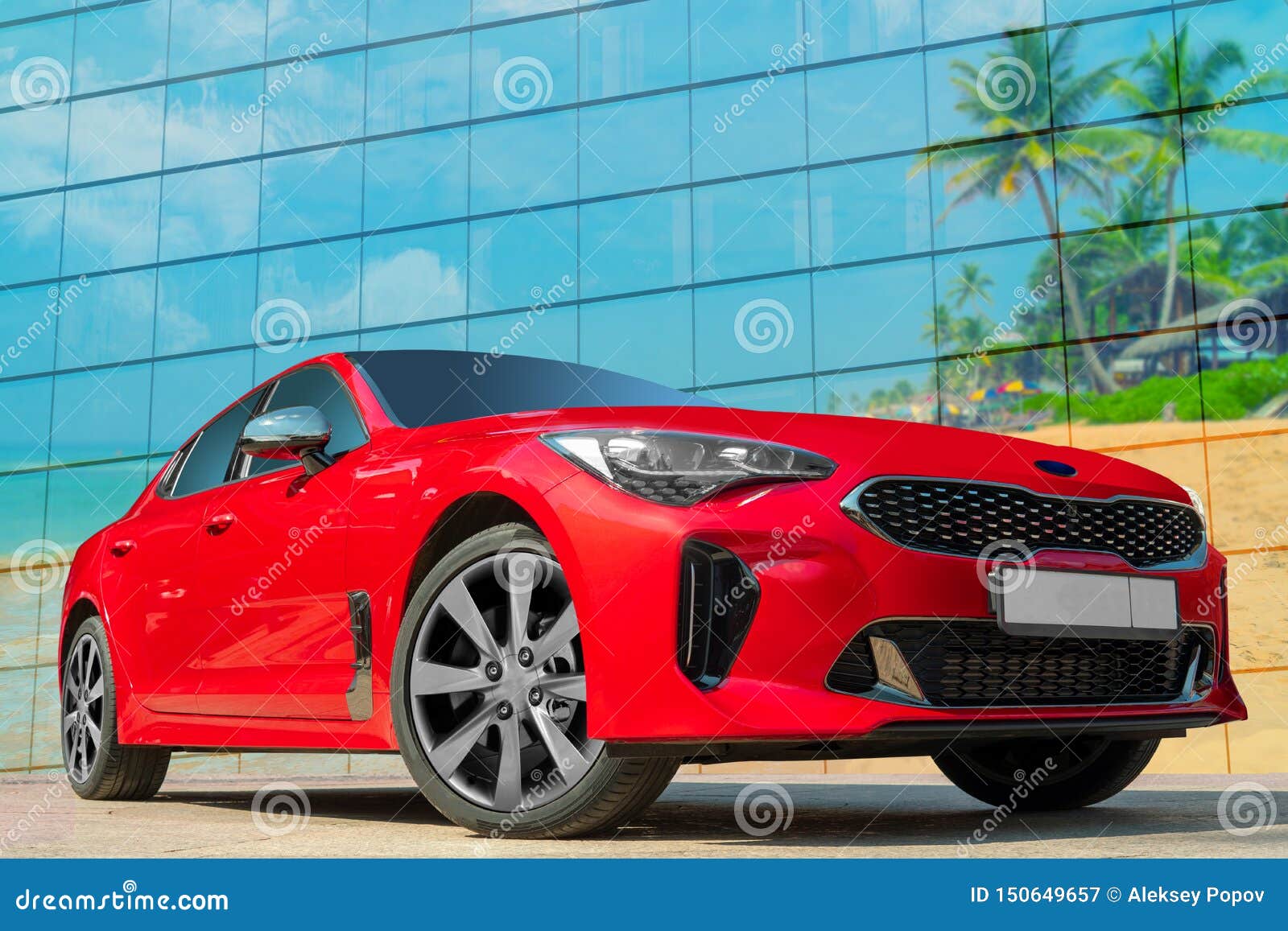 Red Car on the Beach and Palm Trees Background. Editorial Photography