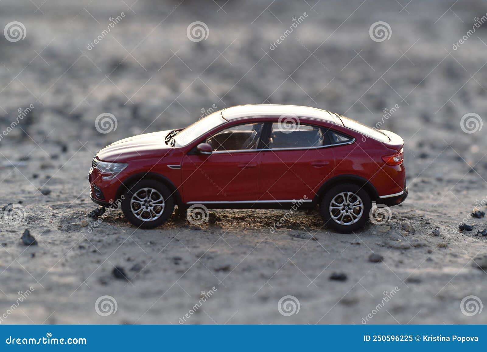 Red Car Model on the Ground Stock Image Image of wheel, sedan 250596225