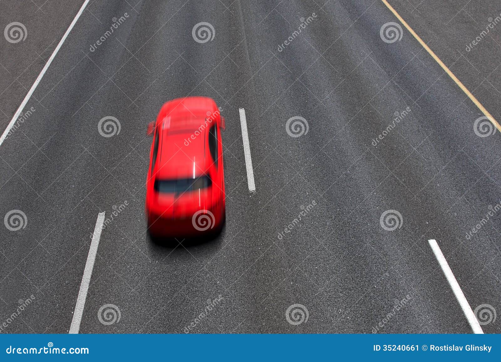 red car moves fast on highway.