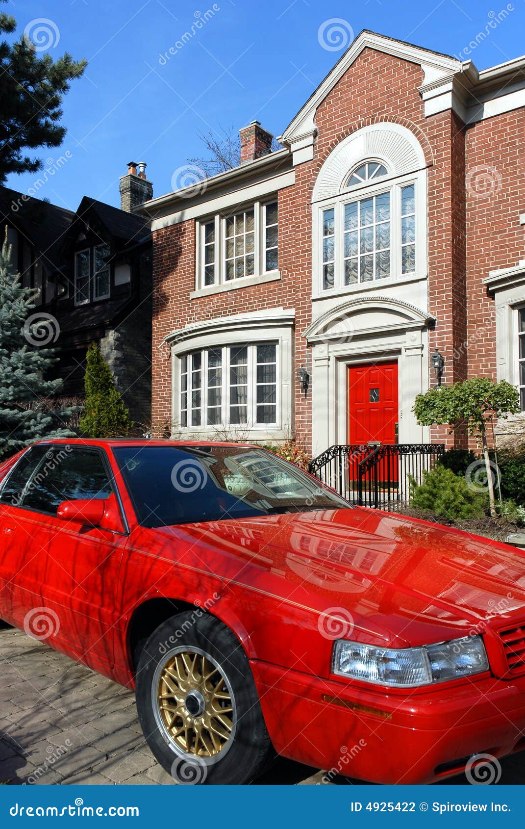 Red Car Parked In Front Of House Stock Photography - Image: 4925422