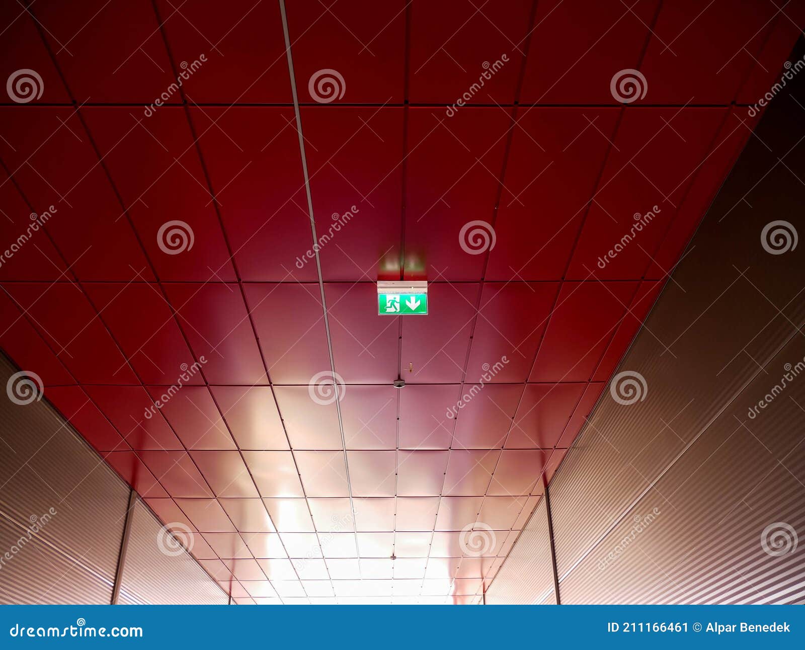 red ceiling at mall ,  empty corridor with exit sign