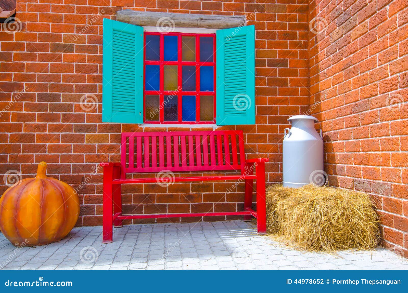Red chair with brick wall stock photo. Image of furniture 44978652
