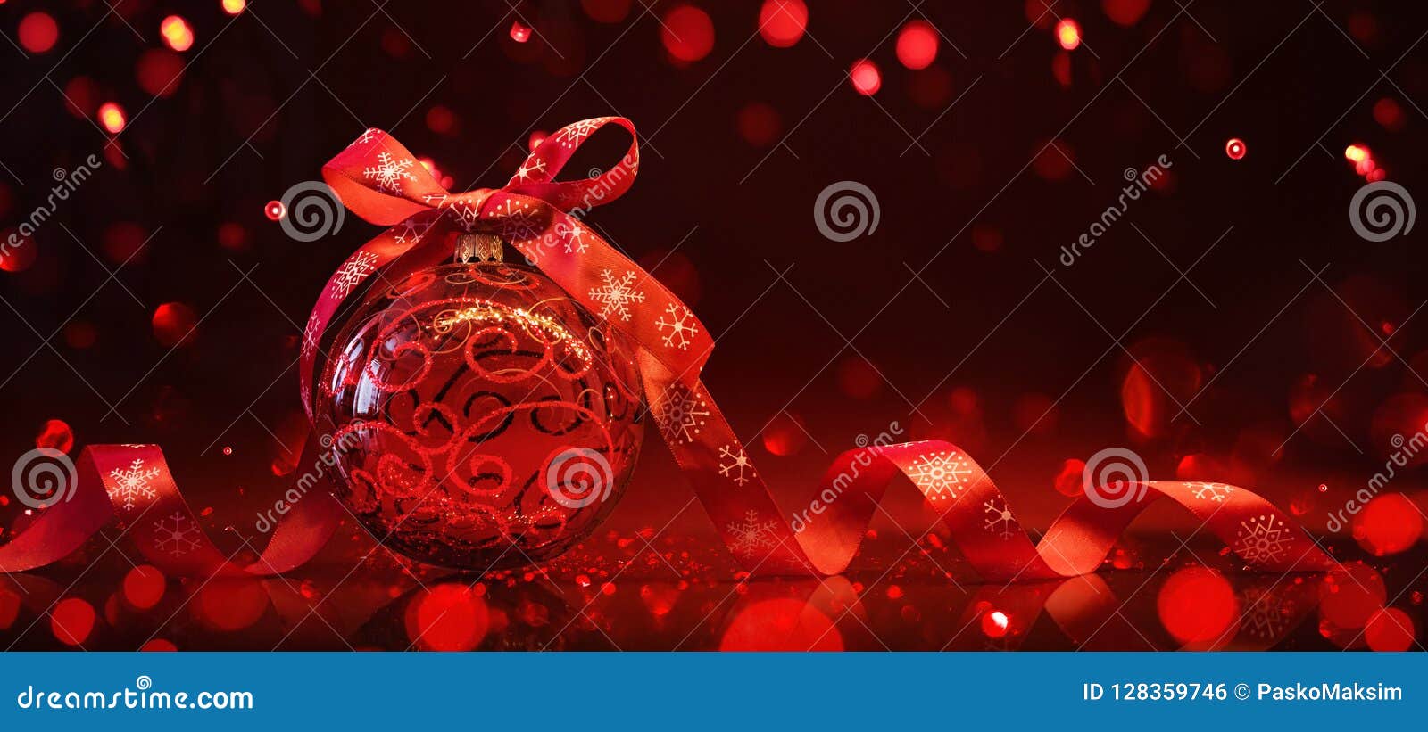 Red Christmas Ball with Reflection and Light Effects Stock Photo