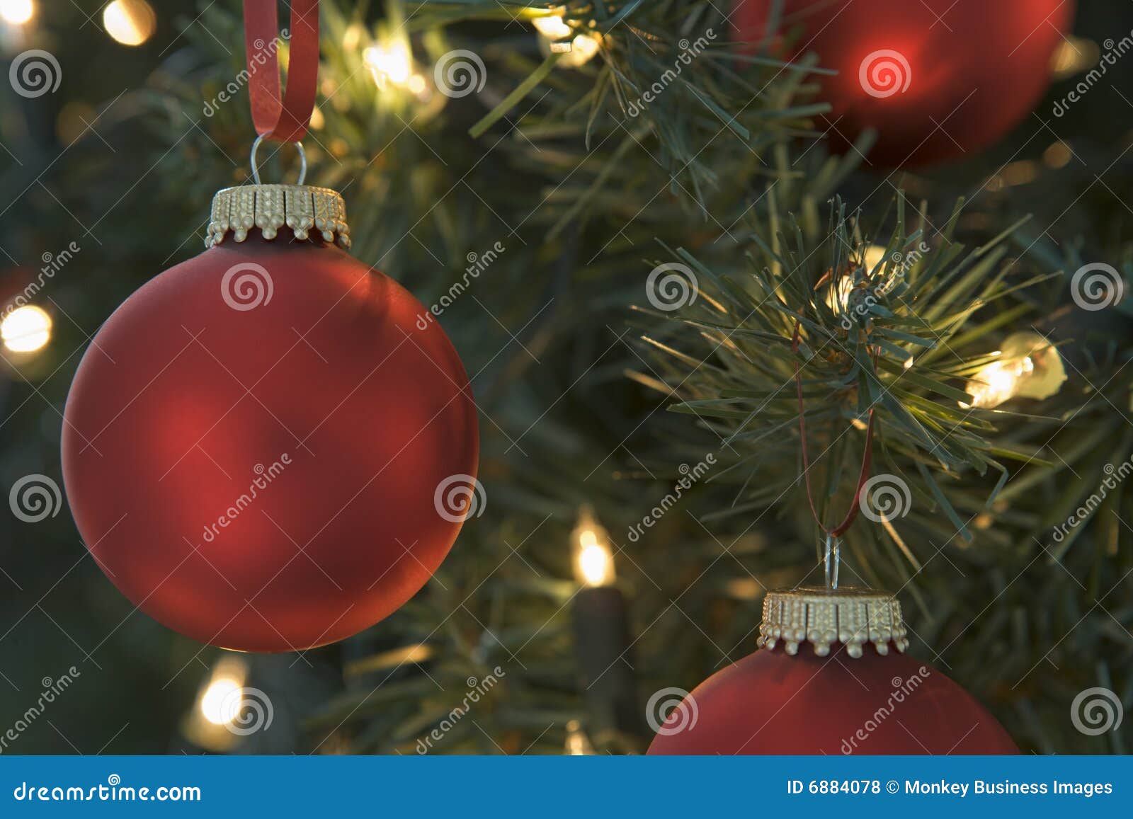 red christmas baubles on tree