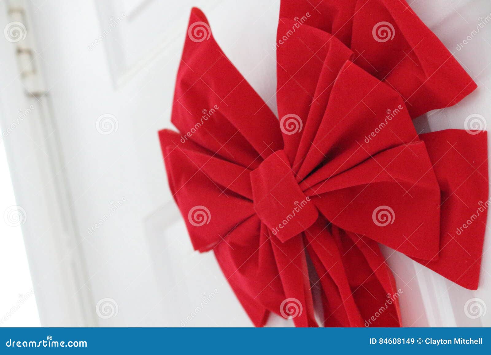 Red Christmas Bow on the Door Stock Image Image of lying, drops 84608149