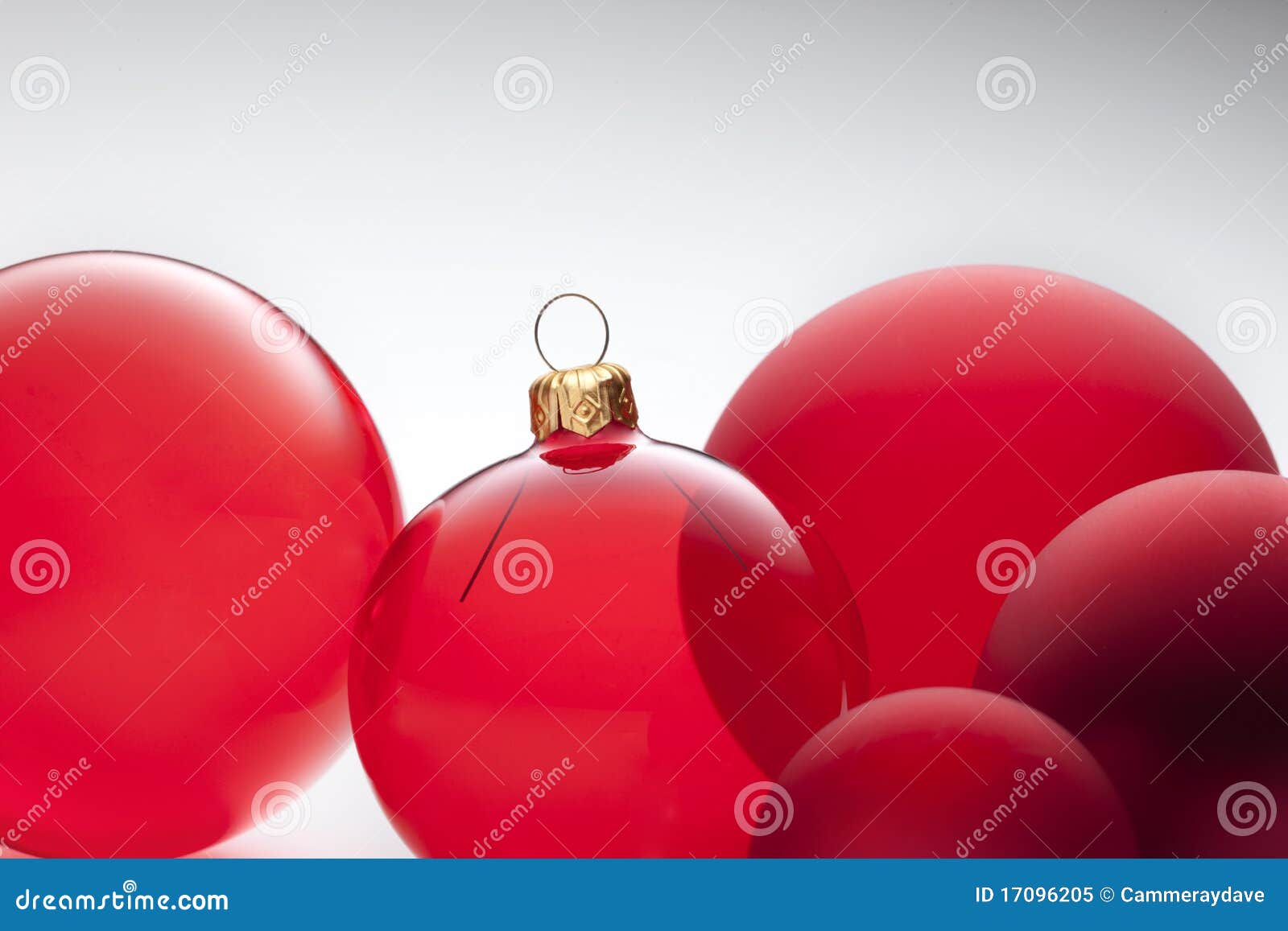 A still-life of red christmas ornaments