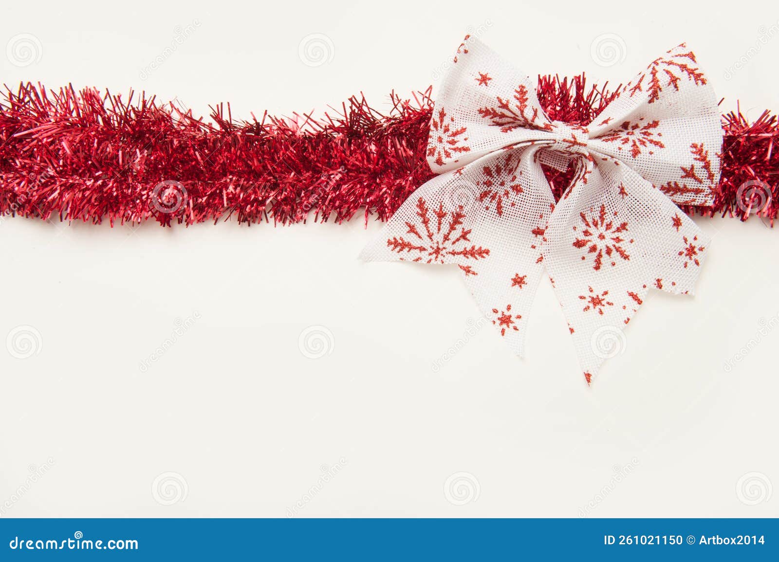 Red Christmas Tinsel with Bow Isolated on White Background Stock Photo