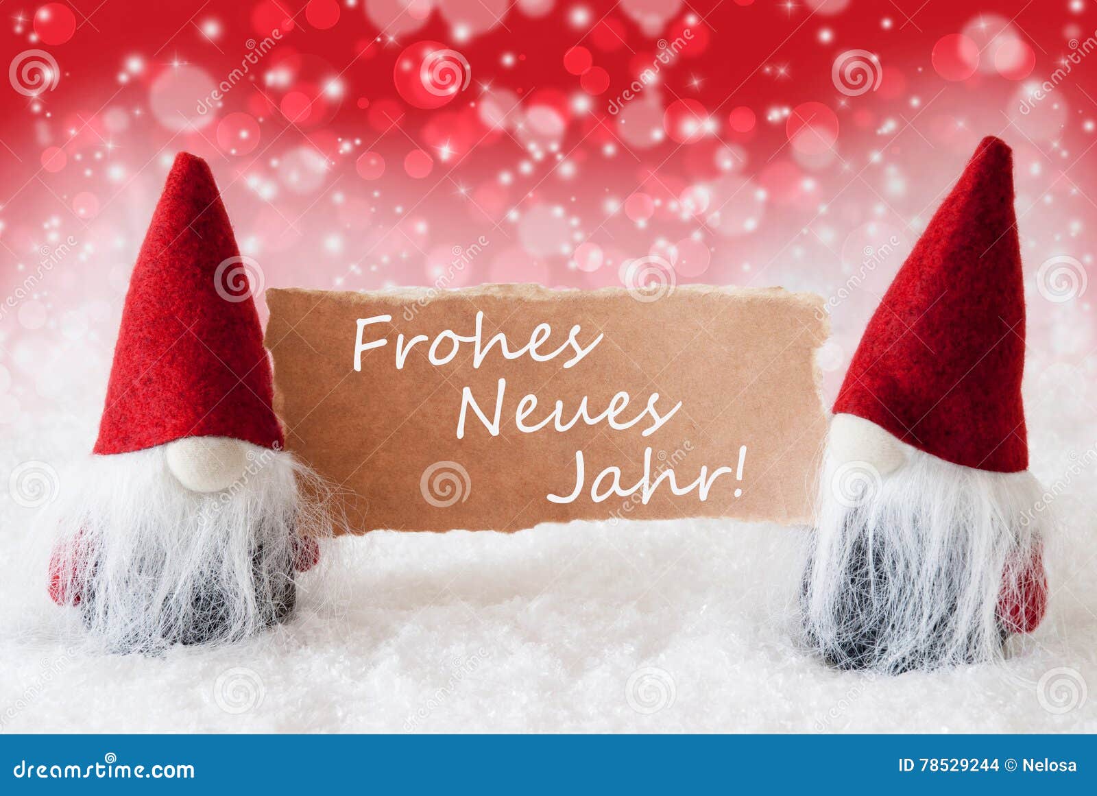 red christmassy gnomes with card, neues jahr means new year