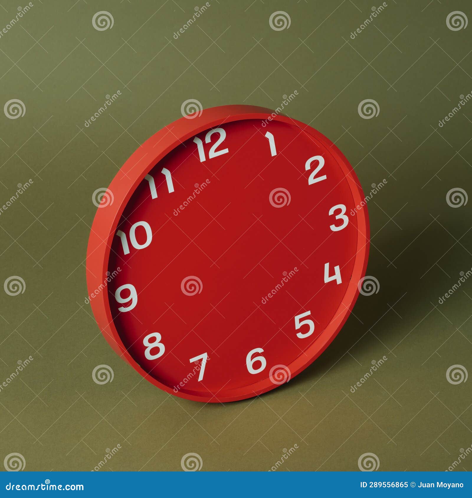 Red Clock without Hands on a Green Background Stock Image Image of