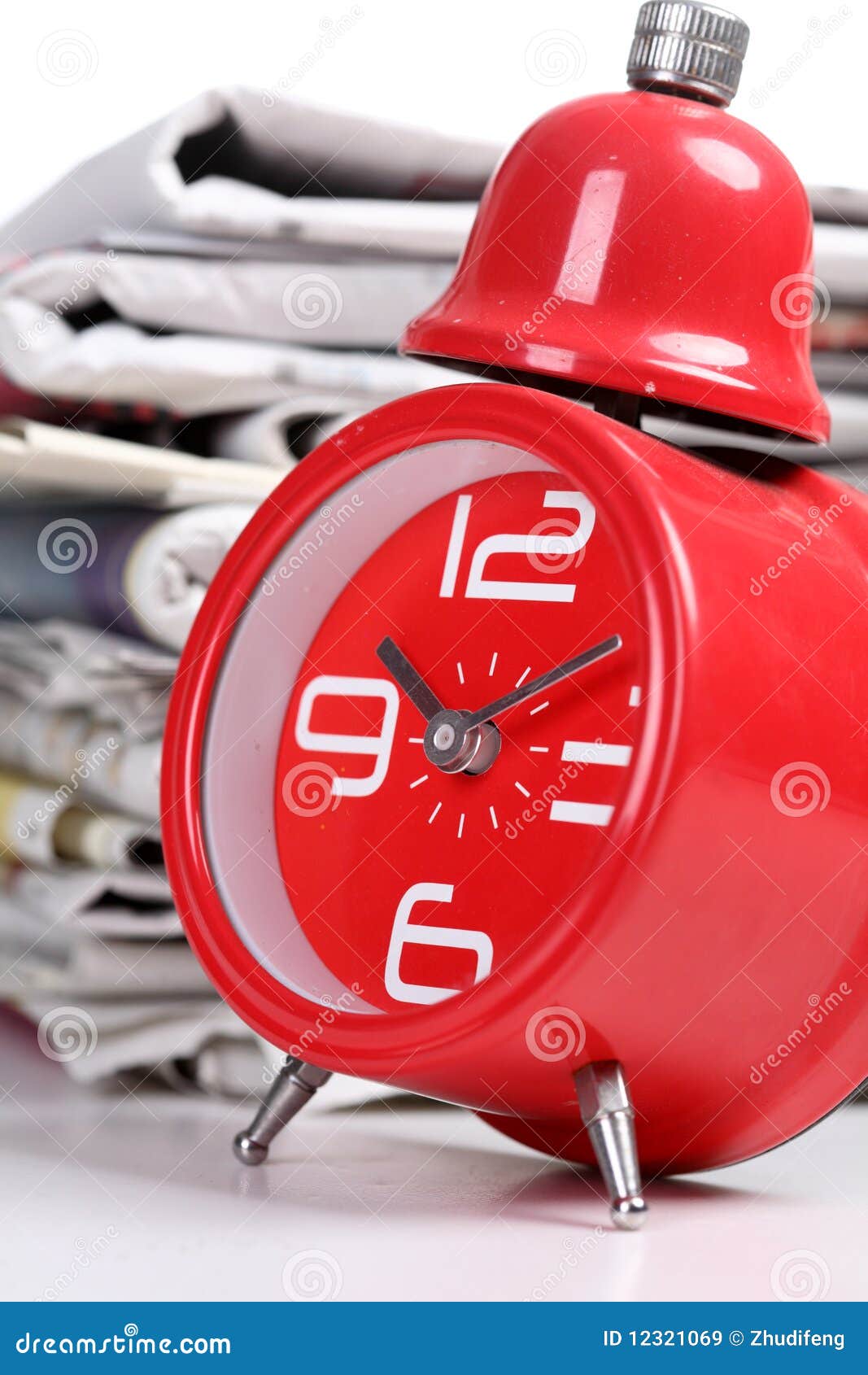 Red clock and newspaper stock image. Image of newsprint 12321069