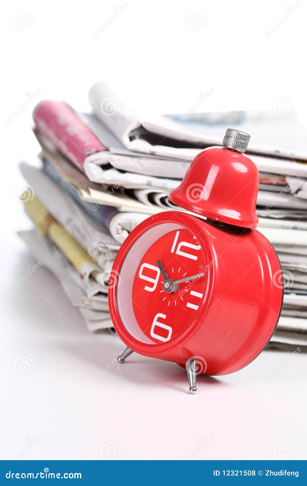 Red clock and newspaper stock photo. Image of magazine 12321508