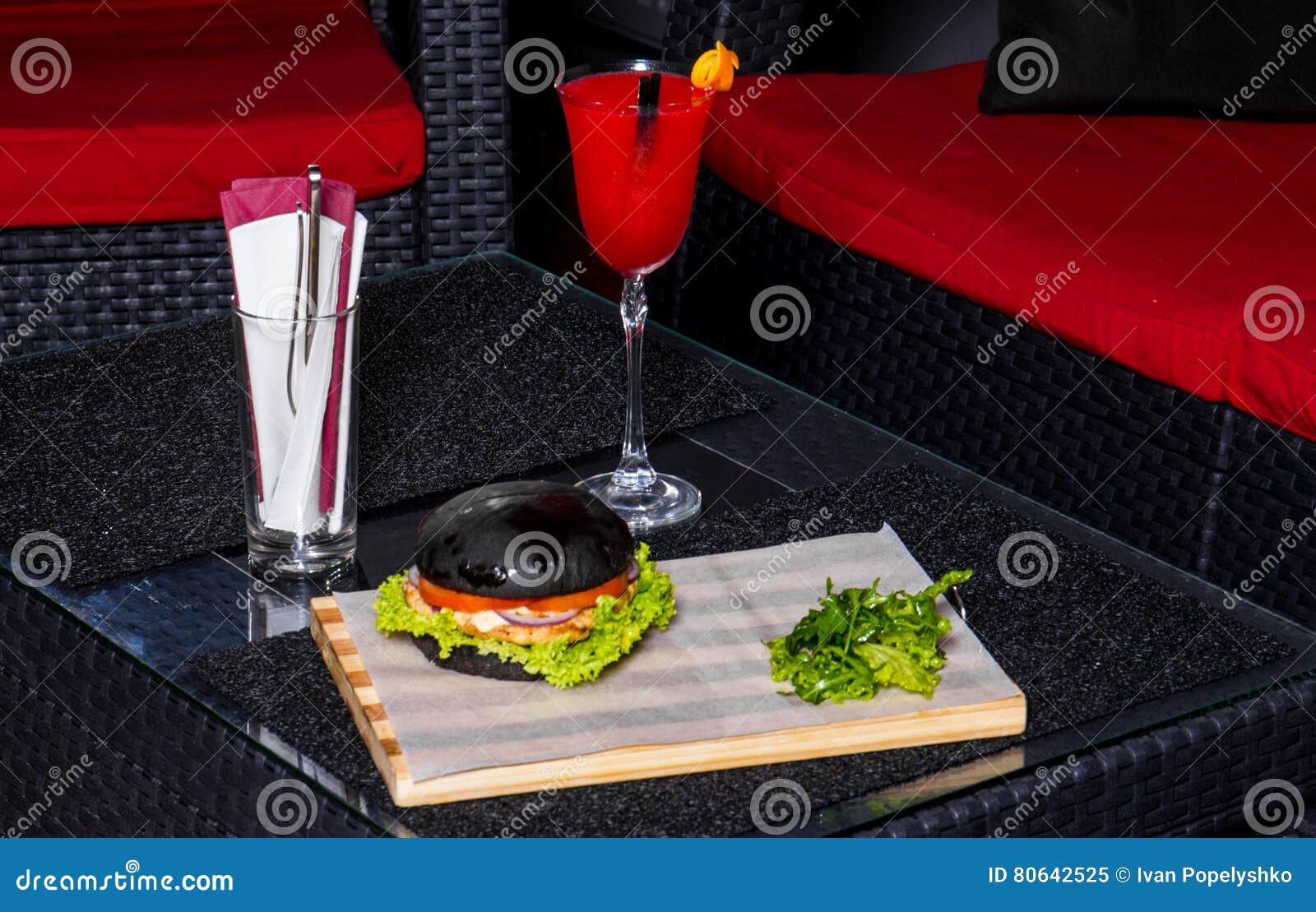 Red cocktail and burger stock image. Image of interior 80642525